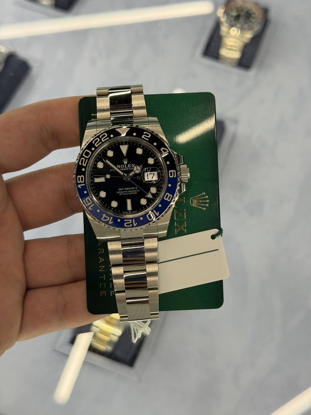 May be an image of wrist watch and text