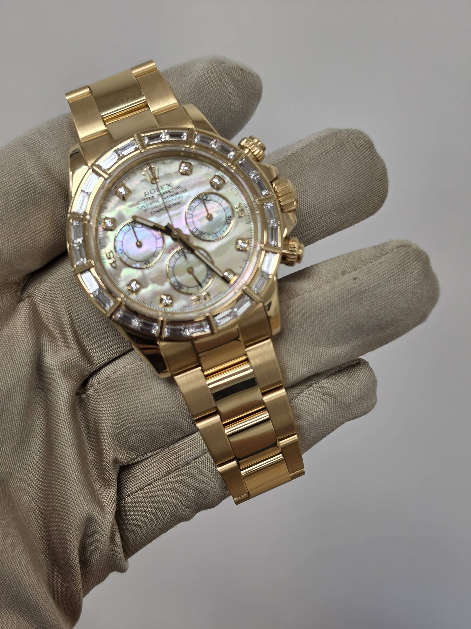 May be an image of wrist watch and text