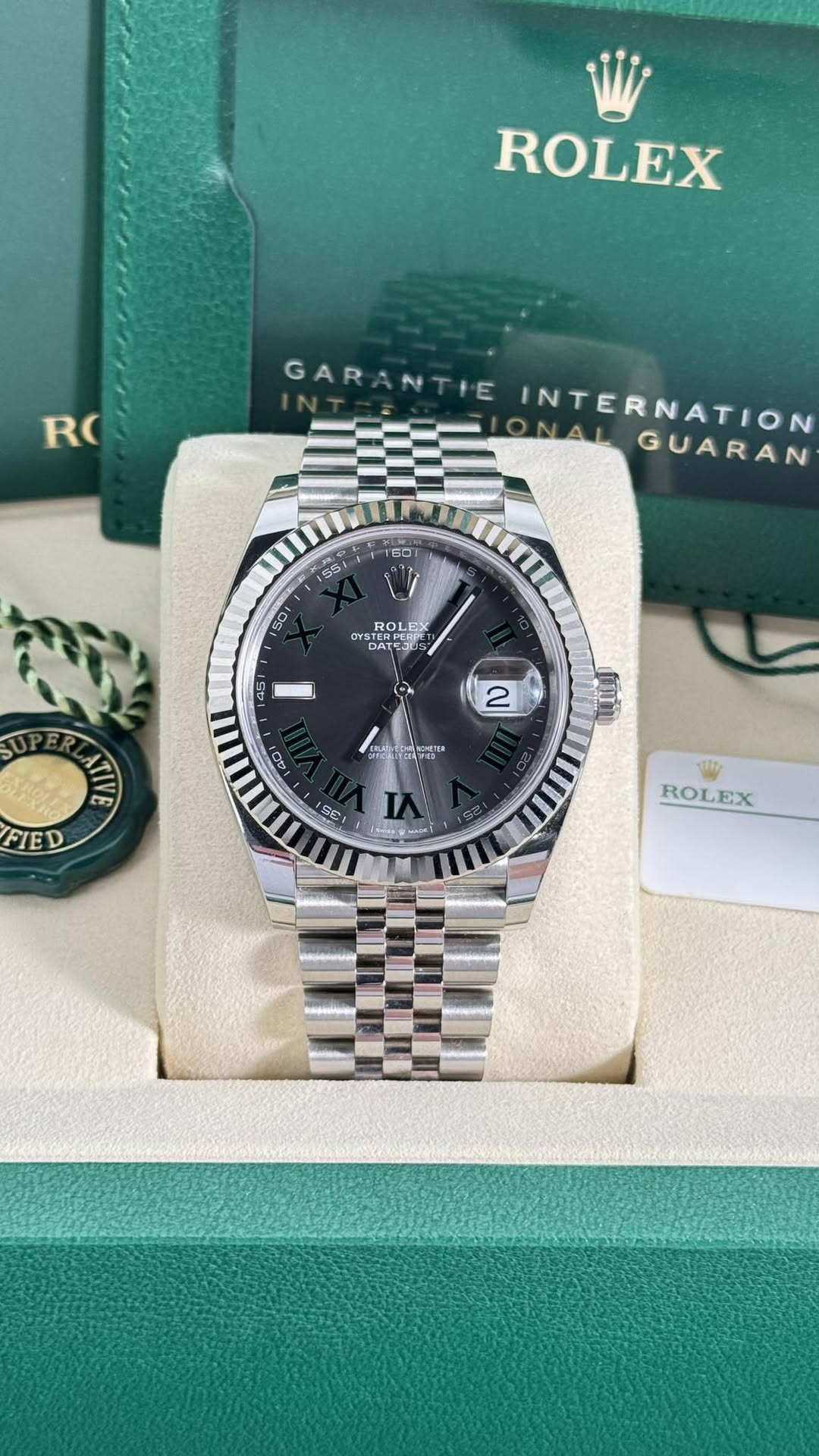 May be an image of wrist watch and text that says 'ROLEX RO GARANTIE NTIE INTERNATION GAR GUARAN 16コ 5S S0 ם TERPE ROL ROLF DAT 45 45 2 TV IA INAL 海能司商 Bwi" a 4C1 FIED D ๐ 35…