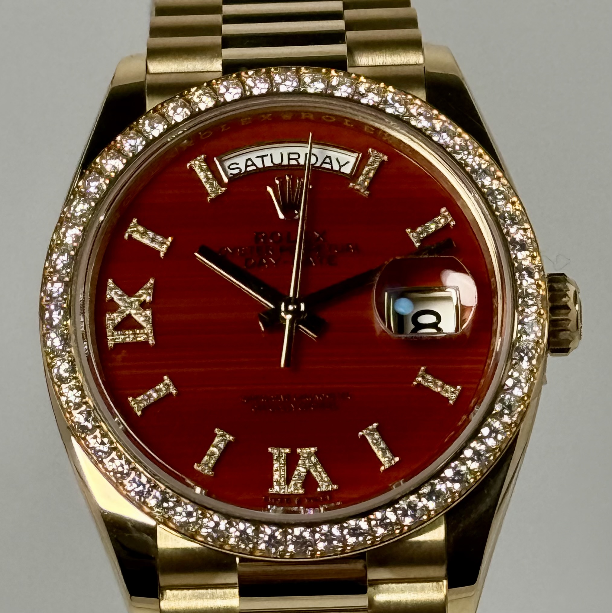 May be an image of wrist watch and text
