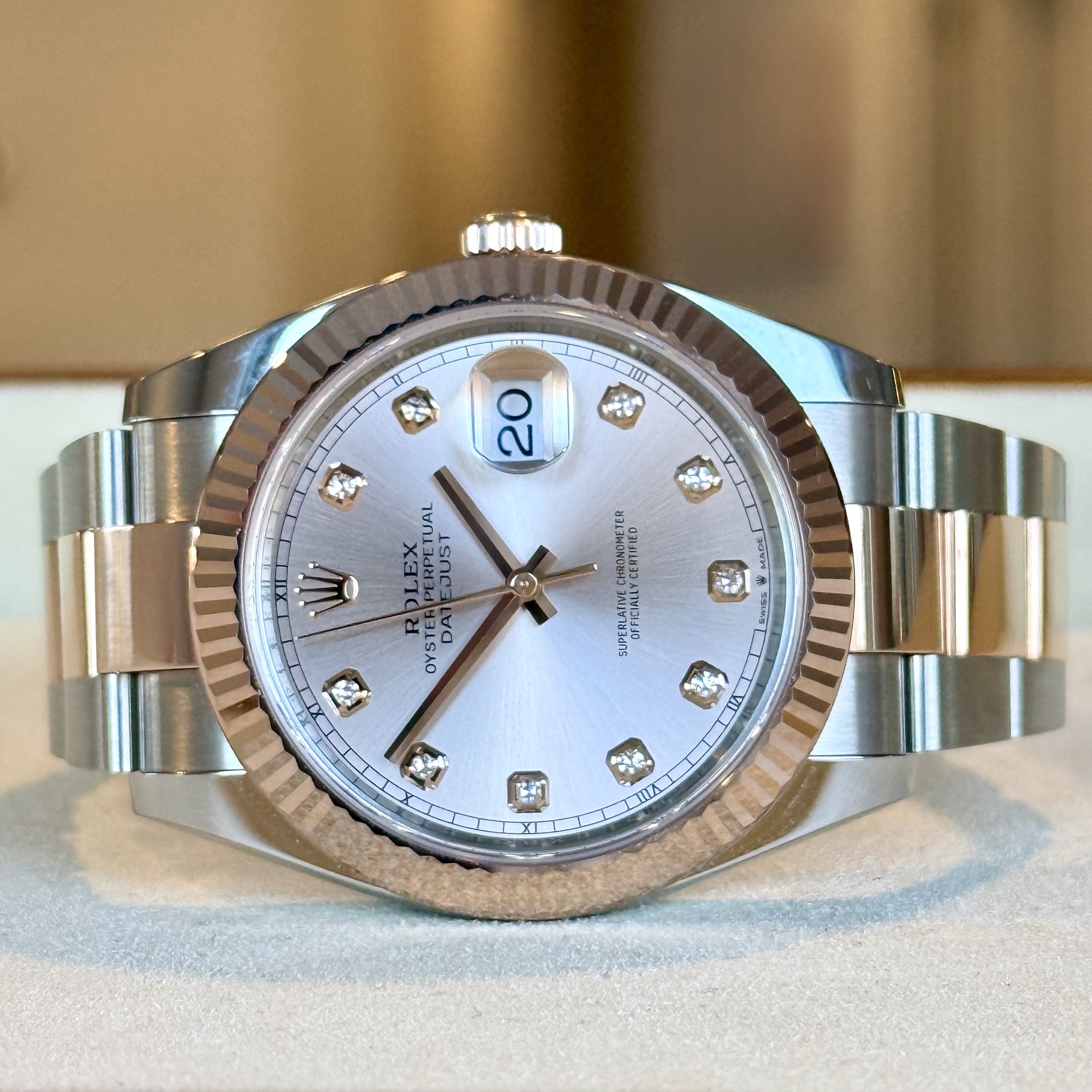 May be an image of wrist watch and text