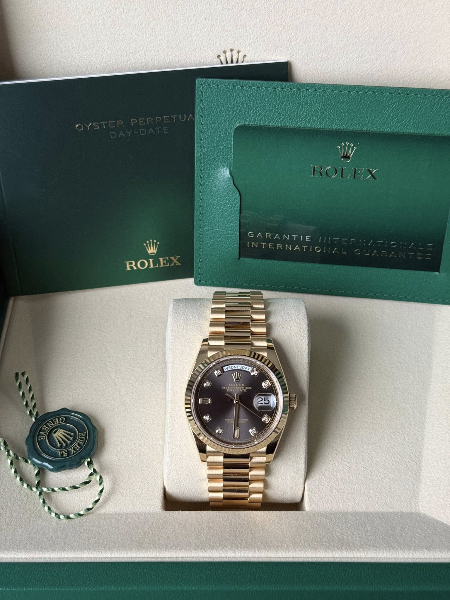 May be an image of wrist watch and text