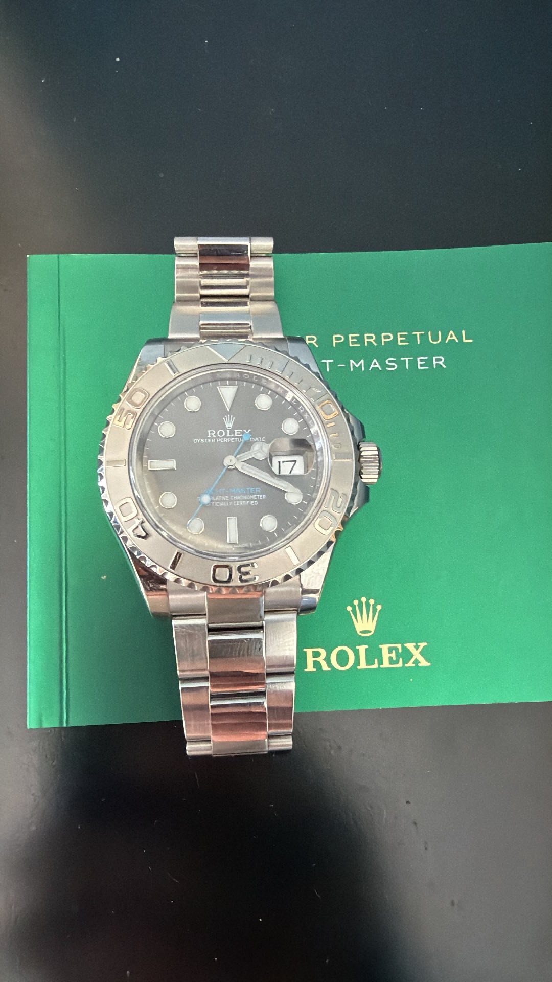 May be an image of wrist watch and text