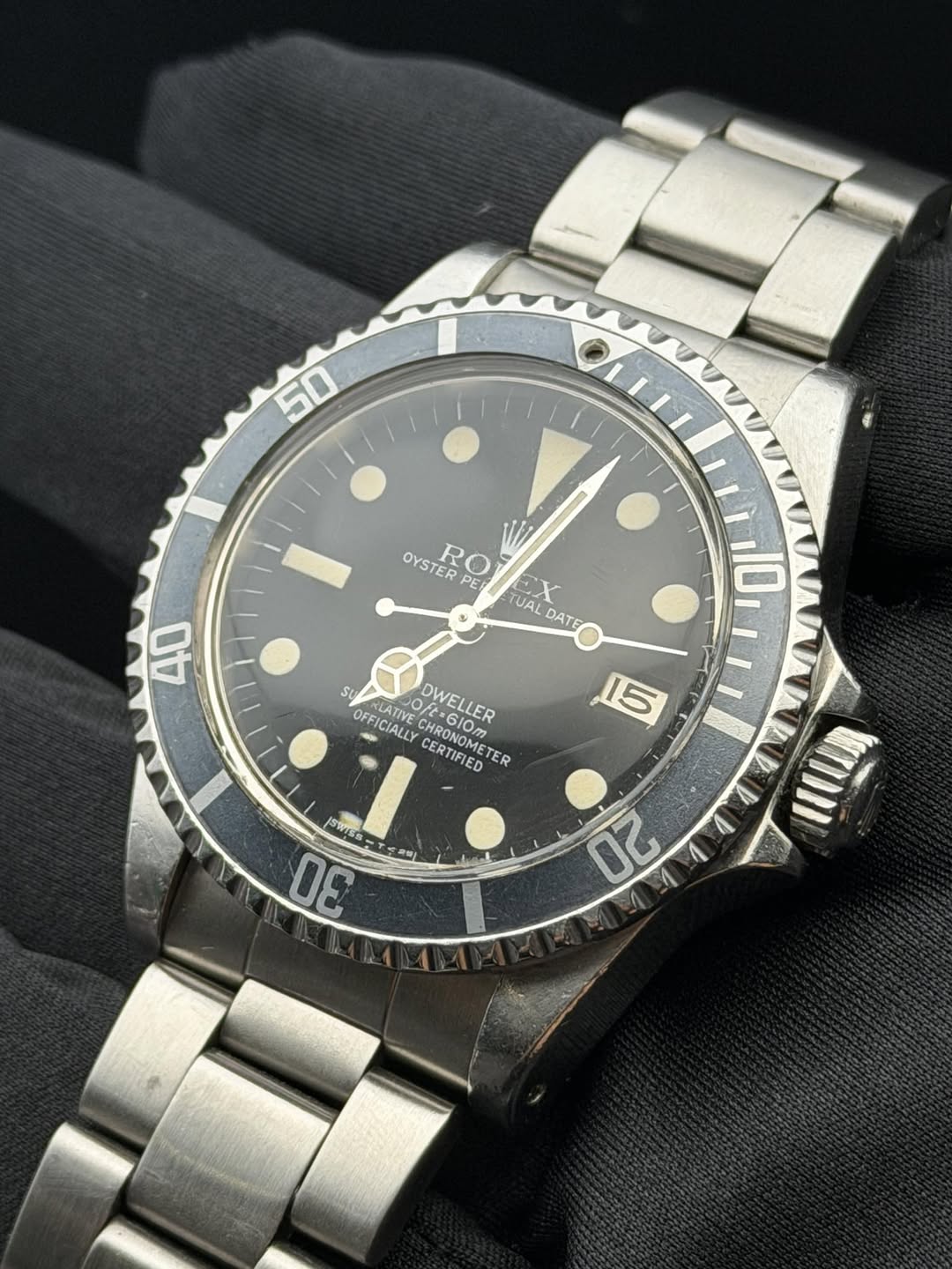 May be an image of wrist watch and text that says ' OYSTER RO OYSTERO R PEI TUAL YCA EX DATE 40 SU RLATIVE CHRONOMETER GlOm ECCIE OFFICIALLY CERTIFLED PARATIVE f・610円 DWELLER…