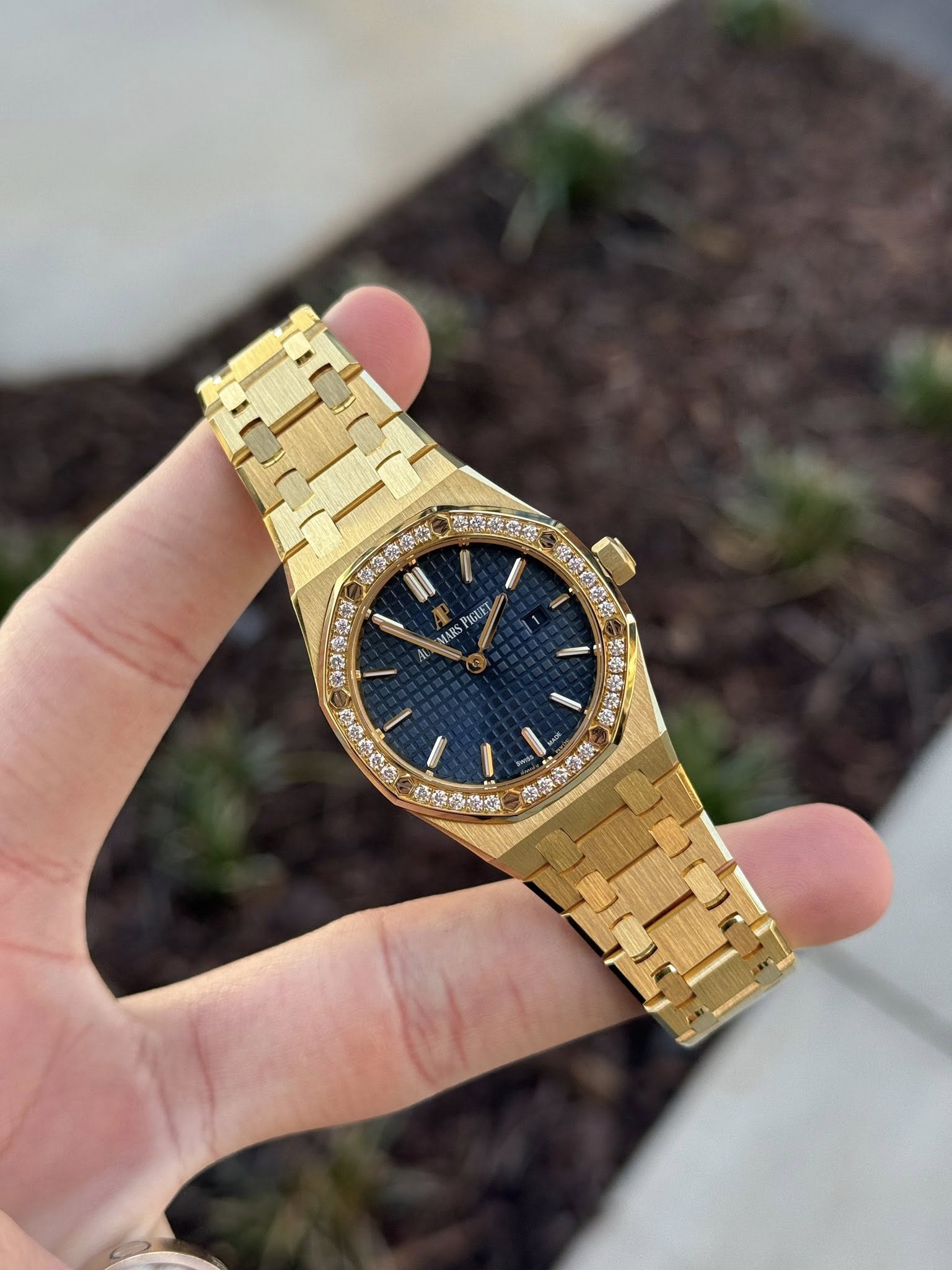 May be an image of wrist watch and text