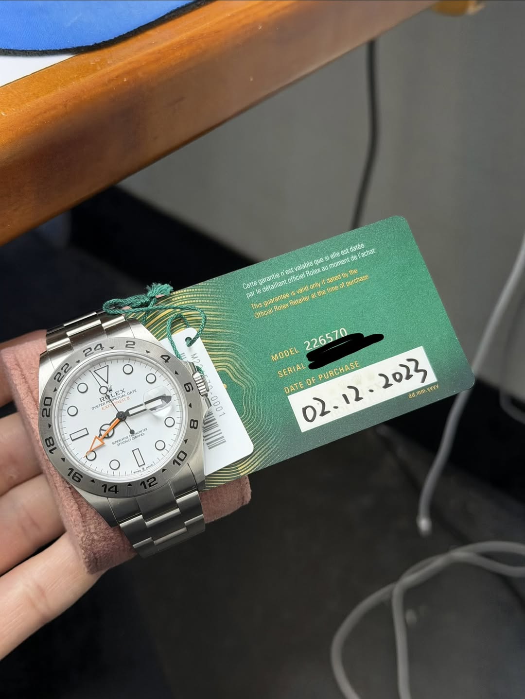 May be an image of wrist watch and text