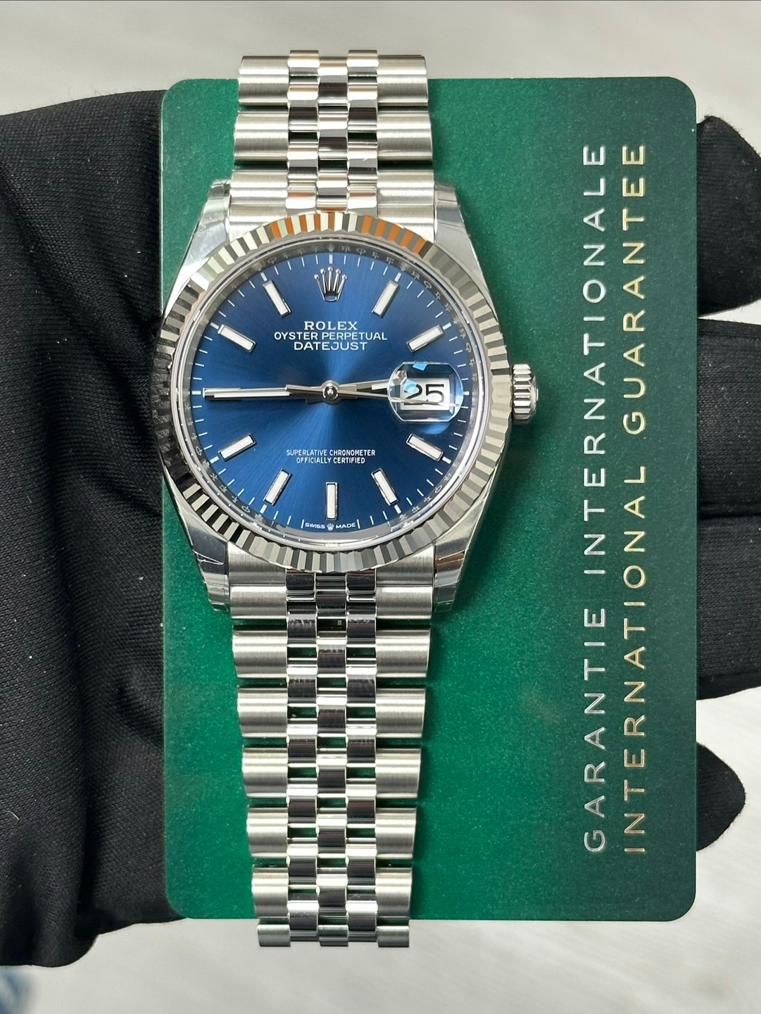 May be an image of wrist watch and text that says 'ROLEX OYS ERPERPET DAT DATEJUST 25 SUPERLATIM UPERLATNVE.CHIOWONETER CHRONCNETER CFFICUALLYCERTIFI CERTIFIED SHHrES MAS LANDIE NO…