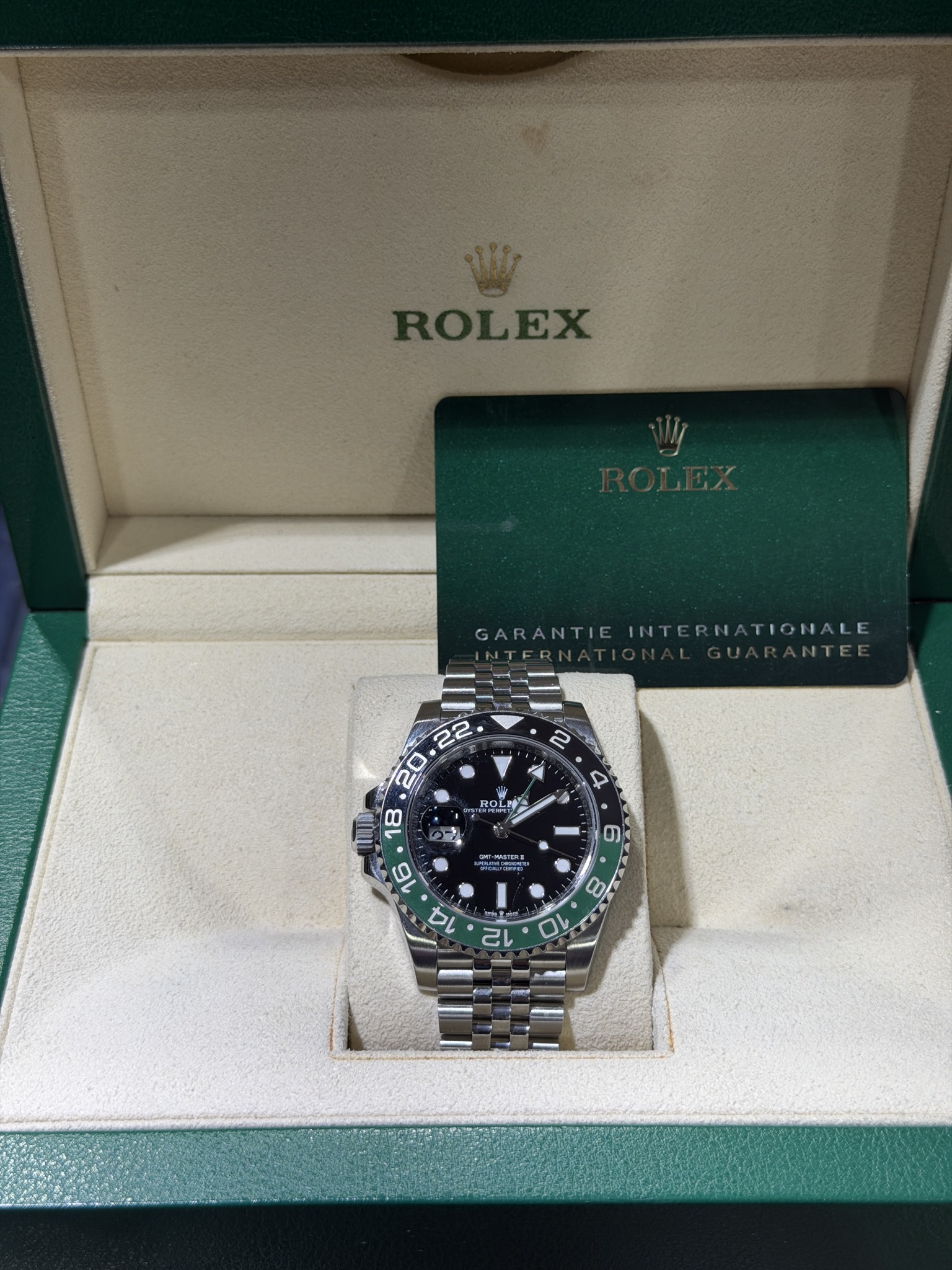 May be an image of wrist watch and text