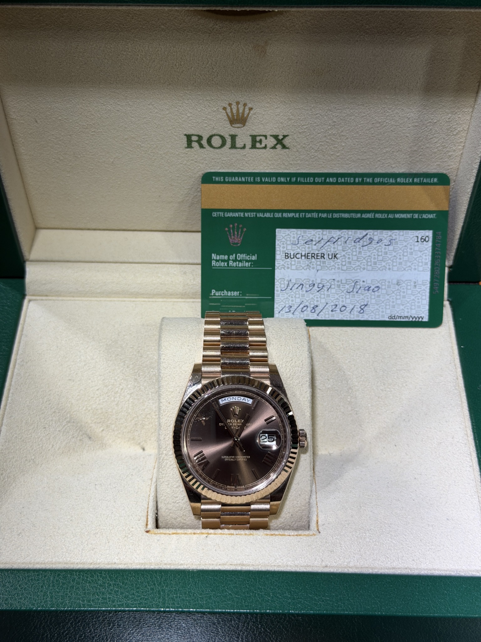 May be an image of wrist watch and text