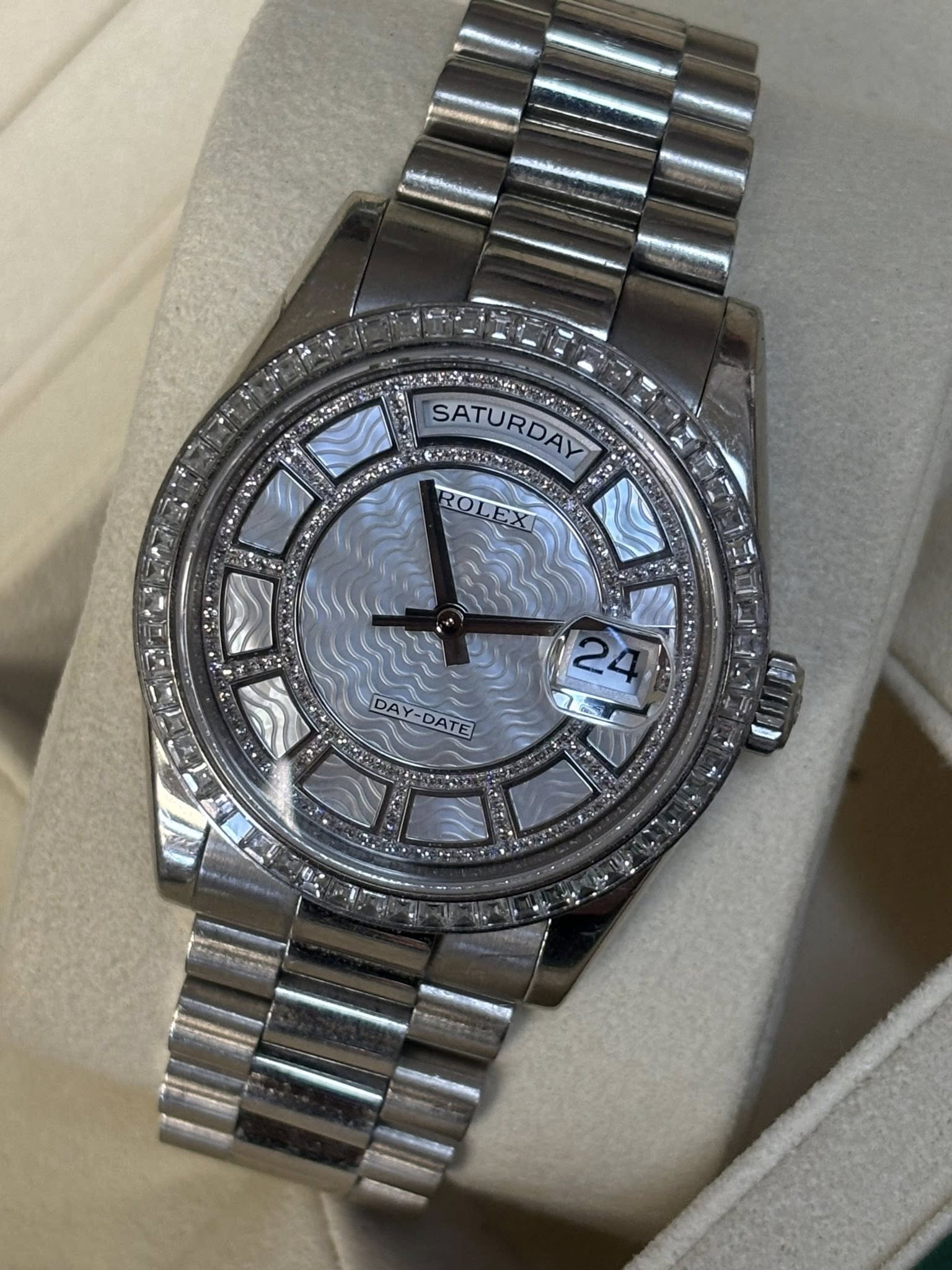 May be an image of wrist watch and text