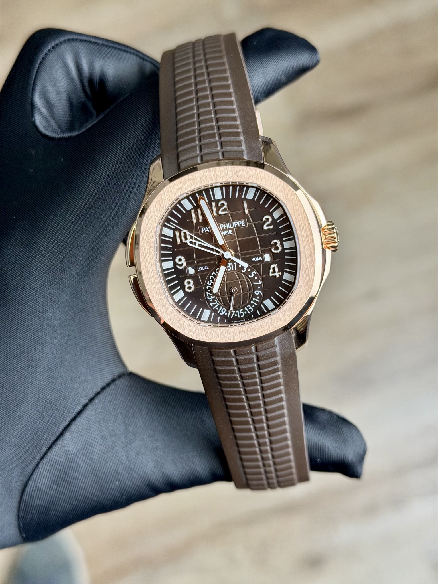 May be an image of wrist watch and text
