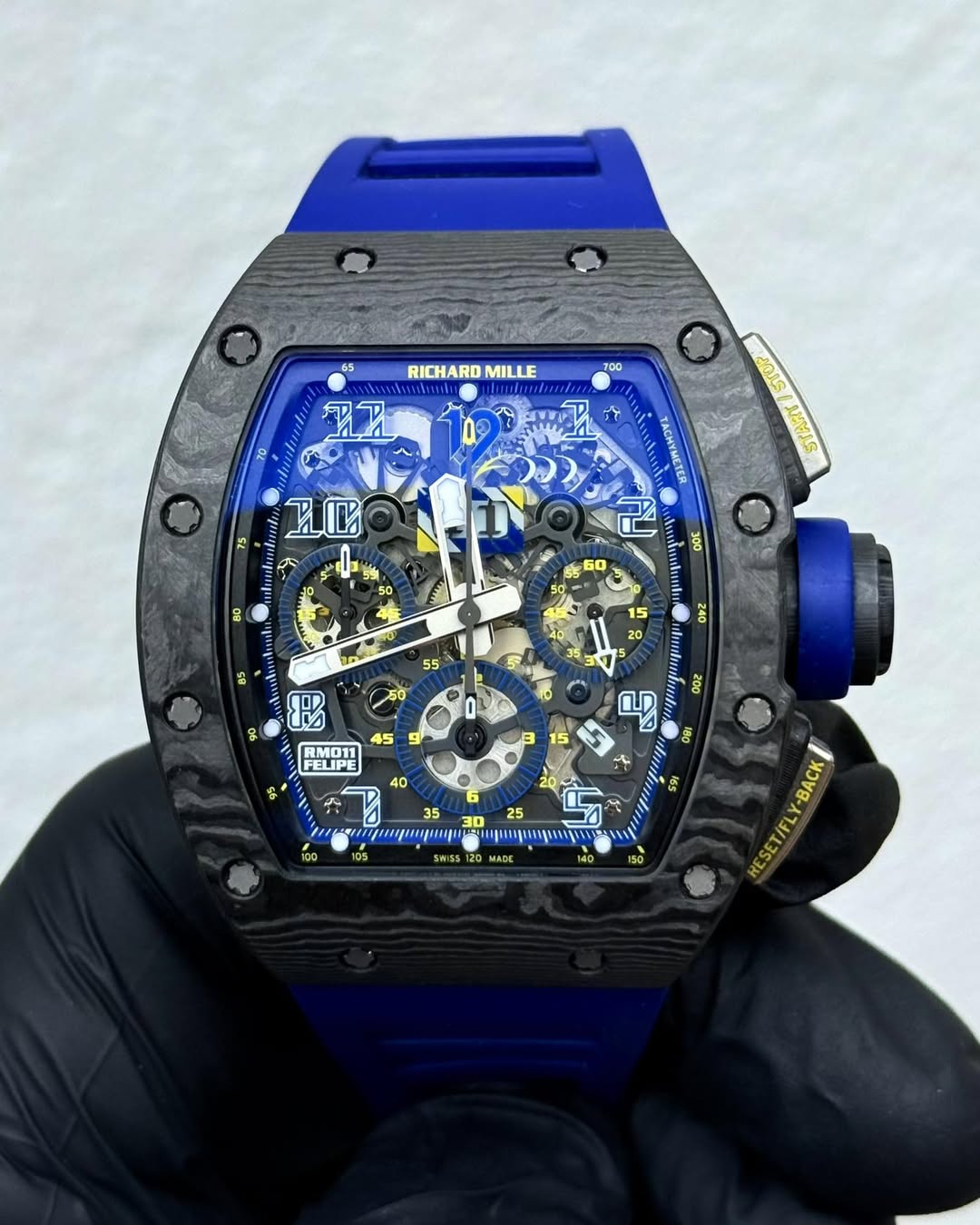 May be an image of wrist watch and text