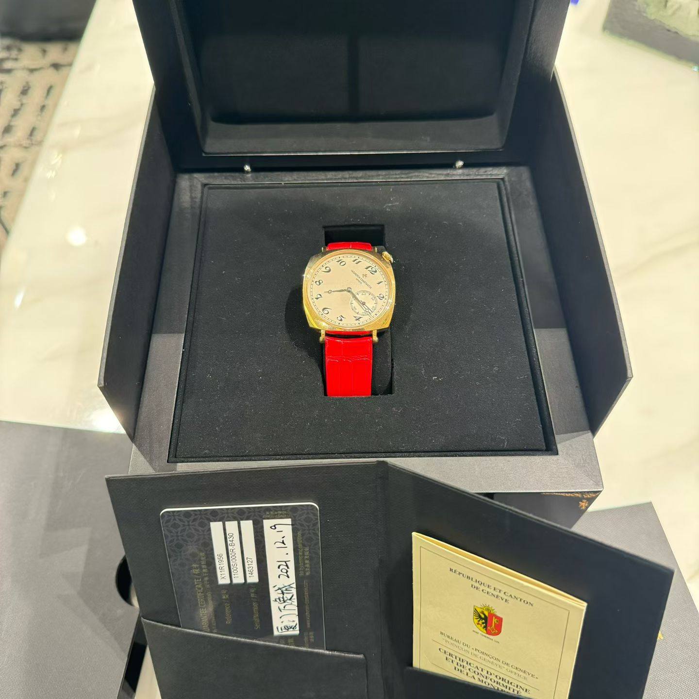 May be an image of wrist watch and text