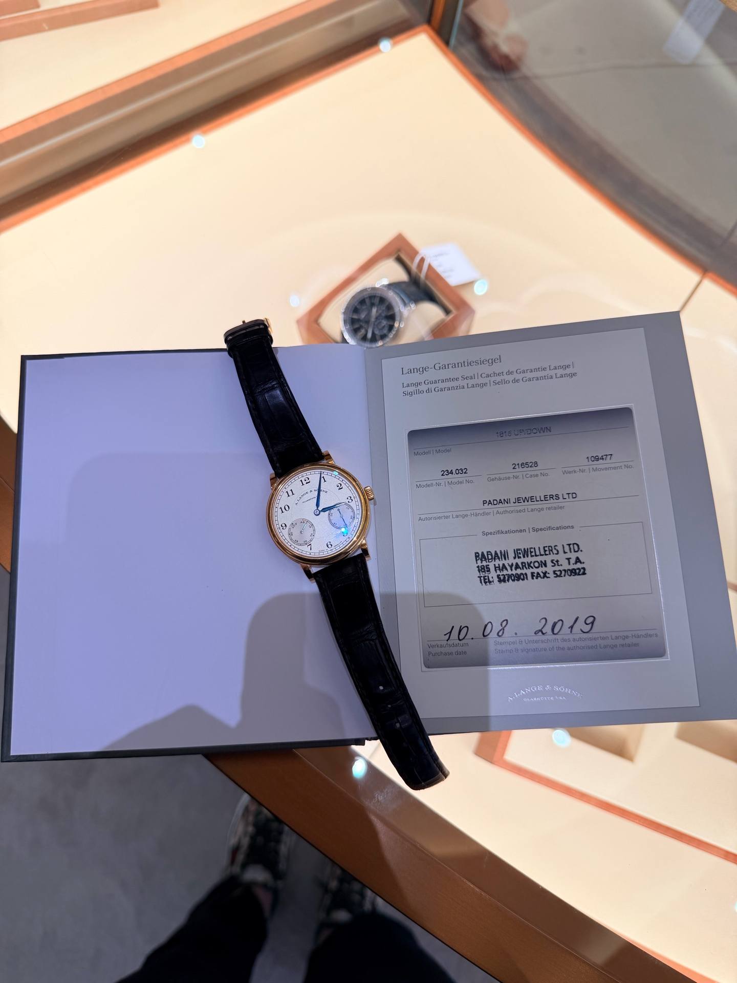May be an image of wrist watch and text