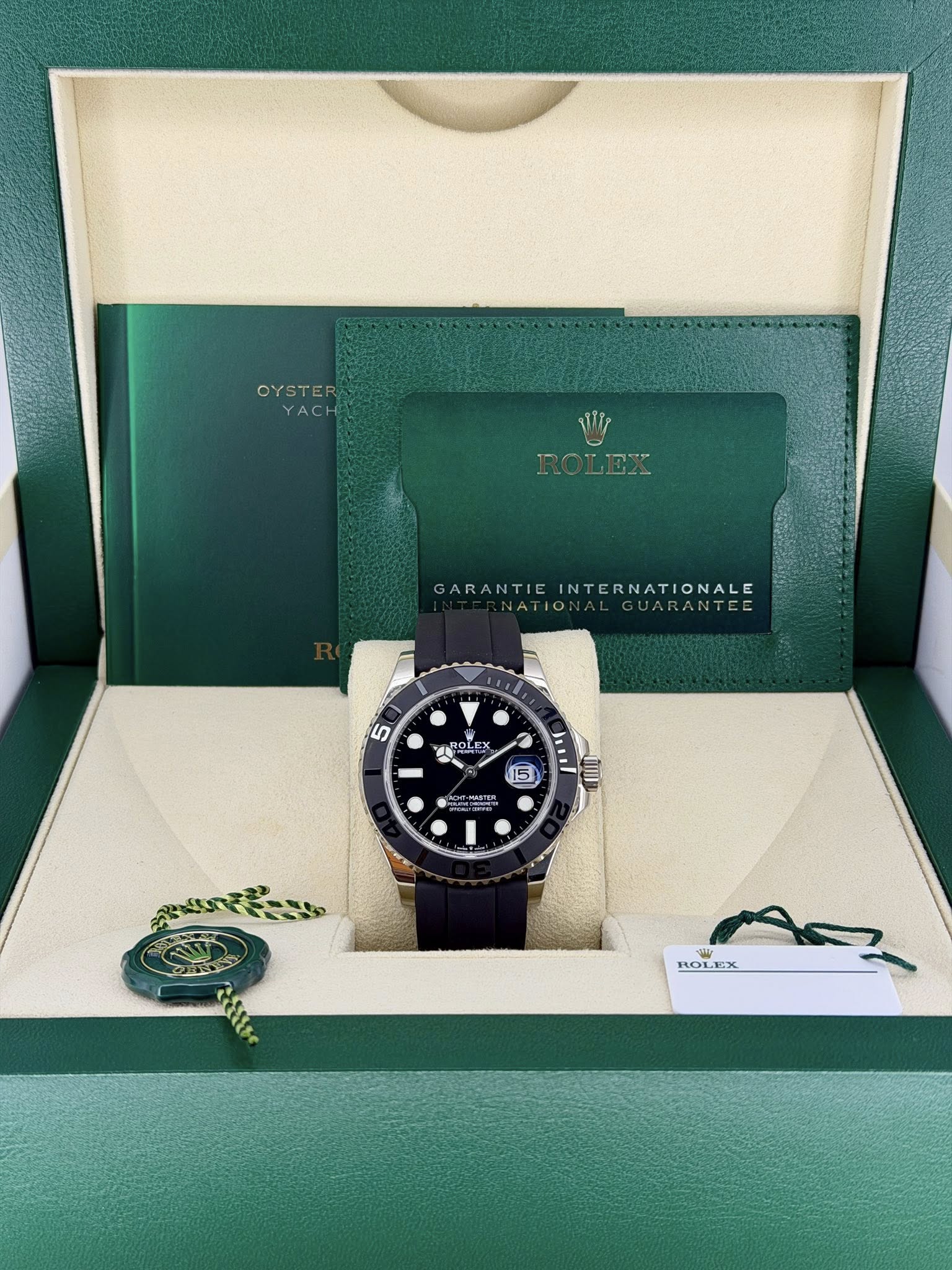 May be an image of wrist watch and text that says 'OYSTER OYSTER YACH WIp ROLEX ROLEX GARANTIE ARANTIEINTERNATIONALE INTERNATIONALE ATIO: or GUARANTEE 5 TiOk TROLEX LEX 15…