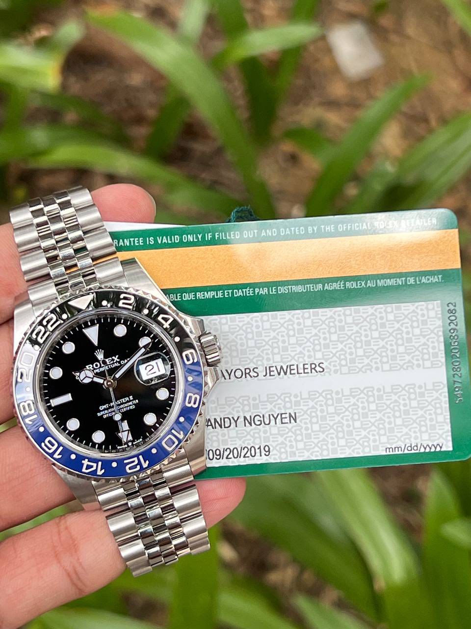 May be an image of wrist watch and text that says 'RANTEE IS VALID ONLY F FILLED OUT AND DATED BY THE OFFICIAL 2 BLE QUE REMPLIE ET DATÉE PARL DISTRIBUTEUR AGREE ROLEX AU MOMENT DE…