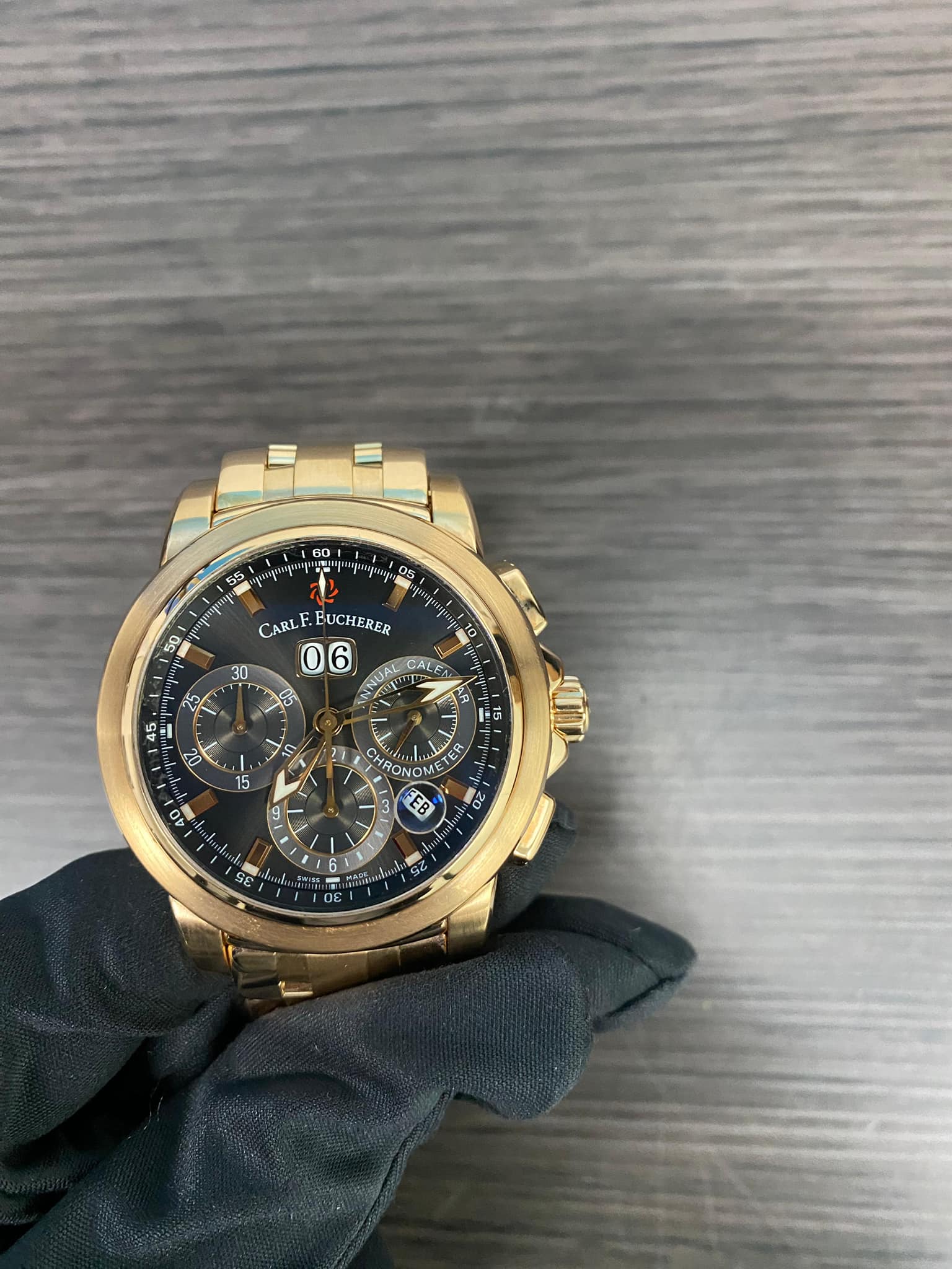 May be an image of wrist watch and text that says '60 05 55 អអ្ននប្ត 50 30 CARLEBUCHERER CARLF BUCHERER 06 5 10 CAL AZ ស AB 2 A 1ጀማ 7S 15 HR RONG N ឃ ER O 海 9 0 EB 0z 6 SE'