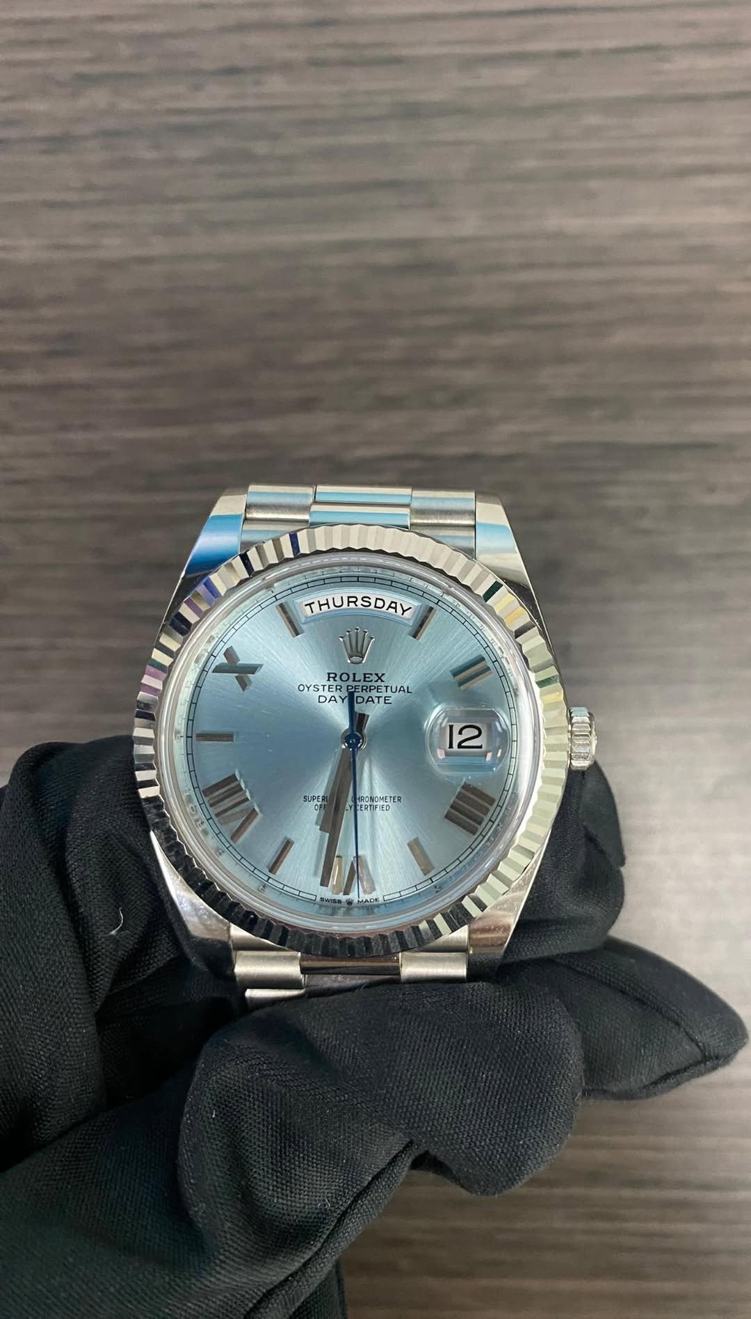 May be an image of wrist watch and text