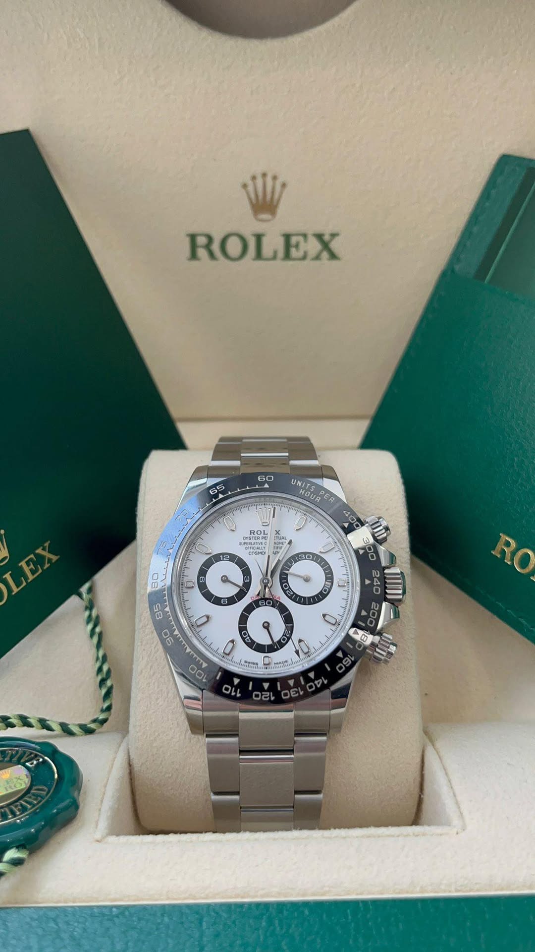 May be an image of wrist watch and text
