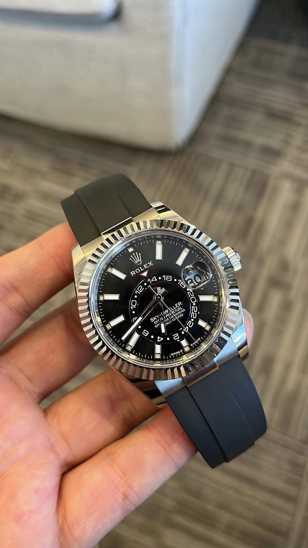 May be an image of wrist watch and text