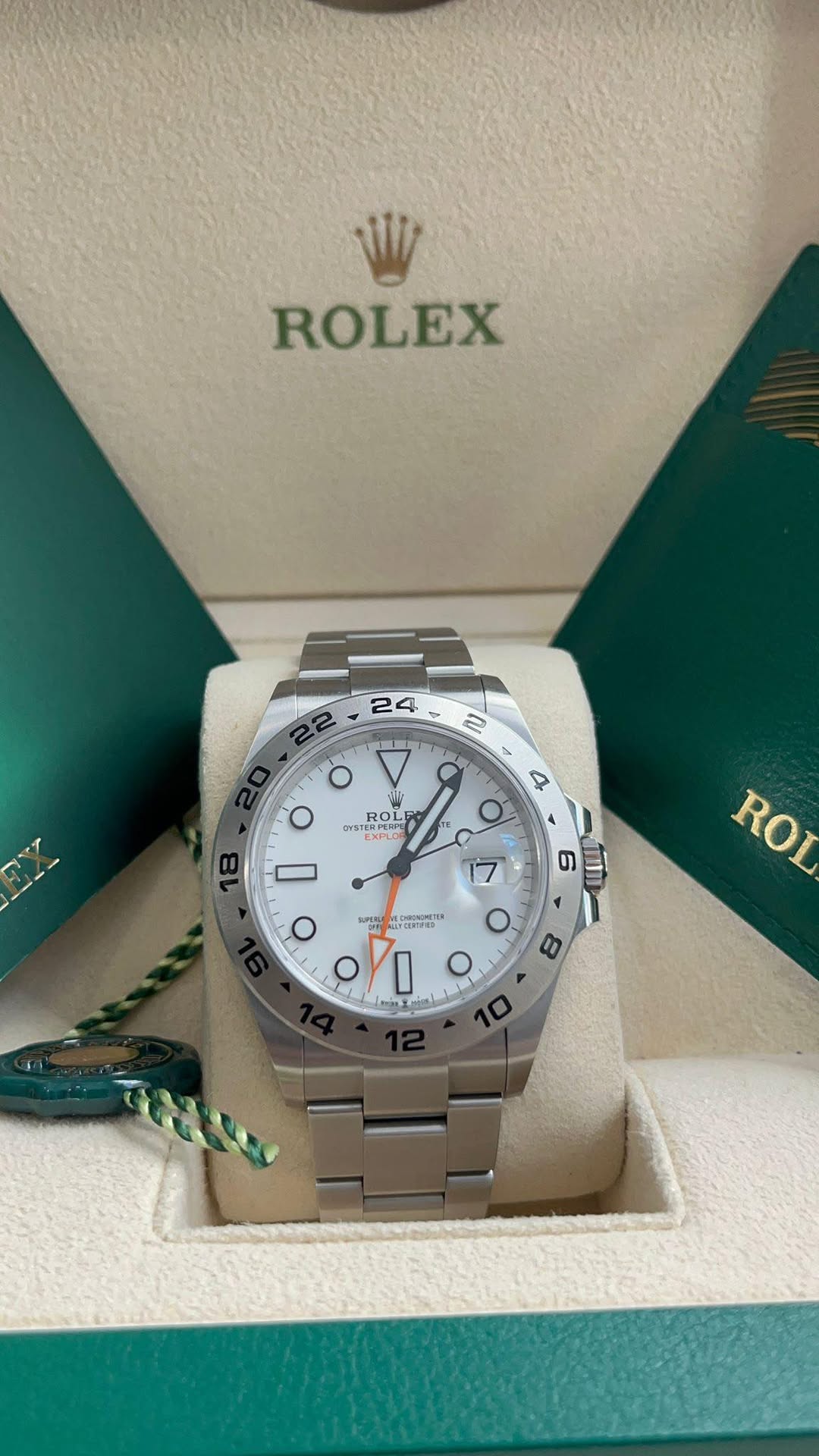 May be an image of wrist watch and text