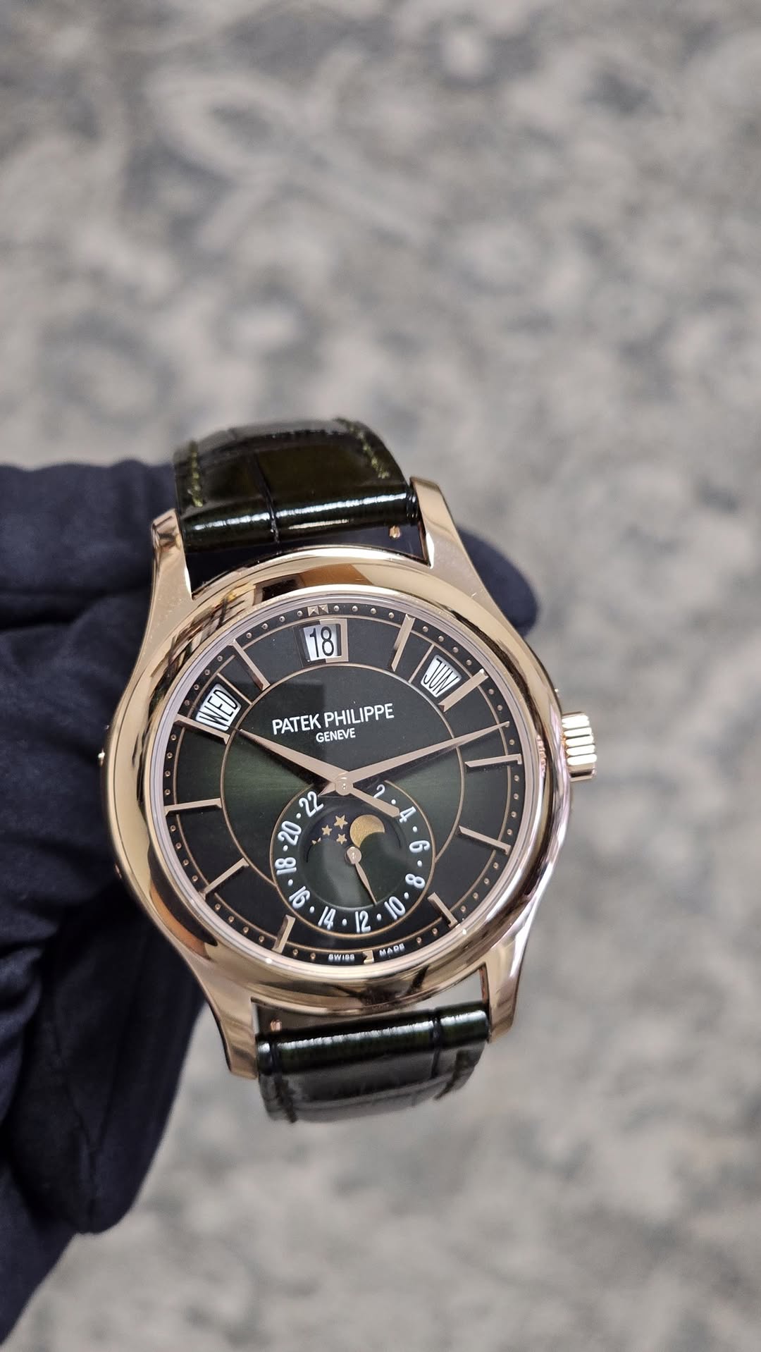 May be an image of wrist watch and text
