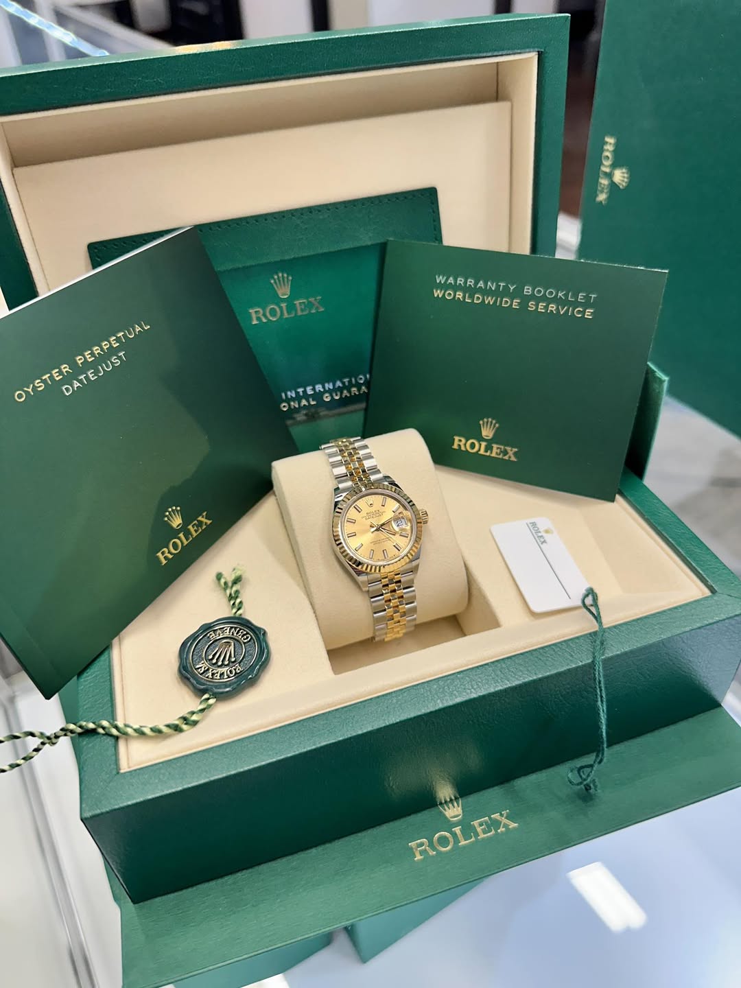 May be an image of wrist watch and text