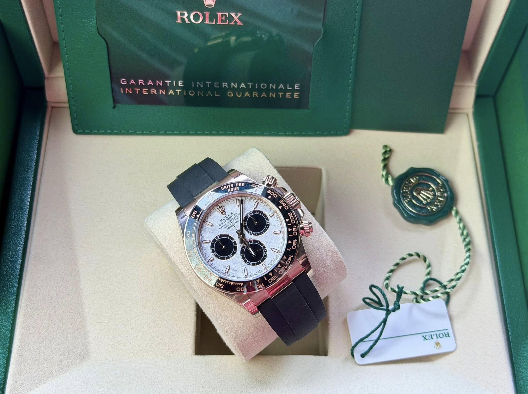 May be an image of wrist watch and text
