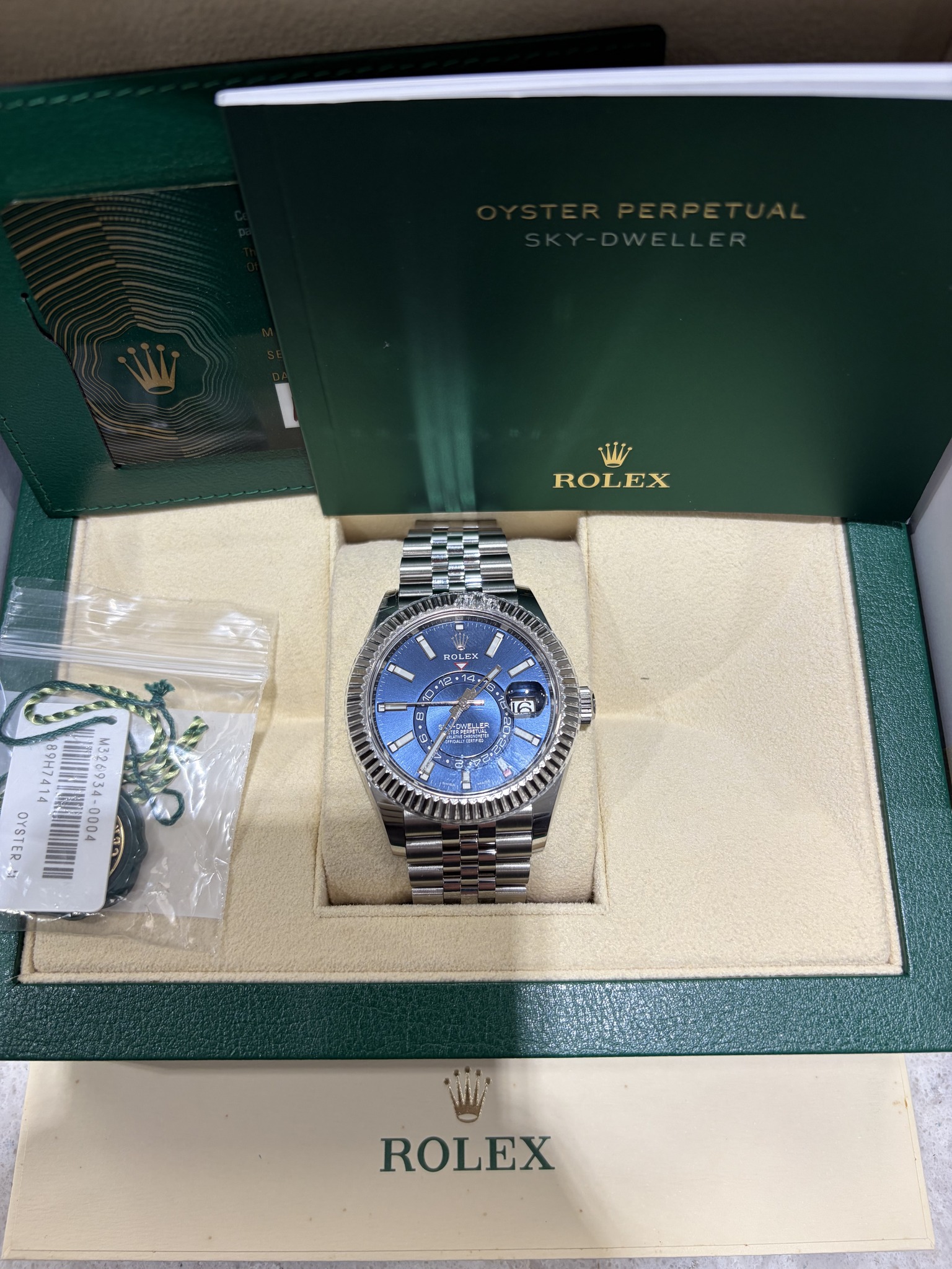 May be an image of wrist watch and text