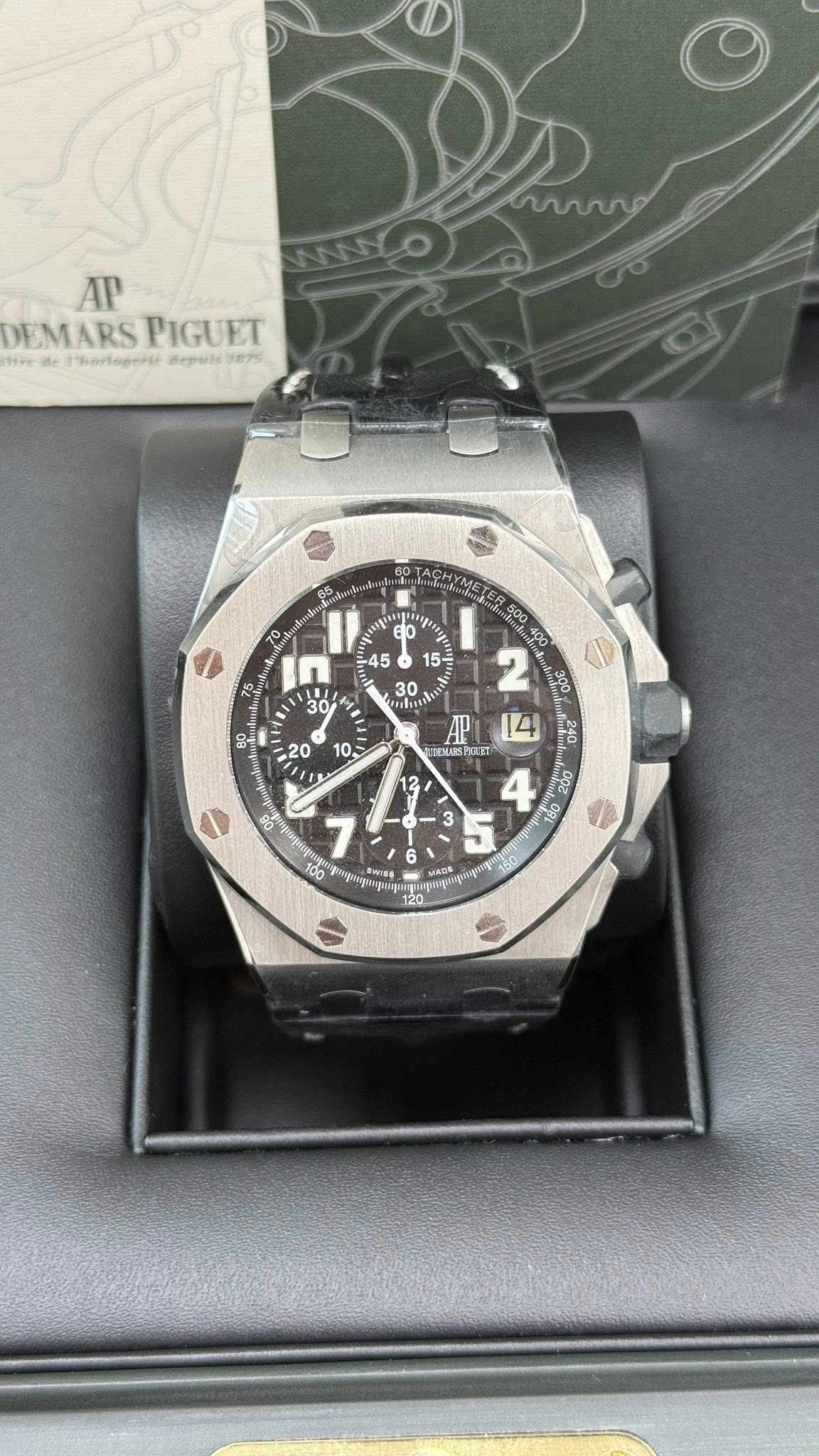 May be an image of wrist watch and text