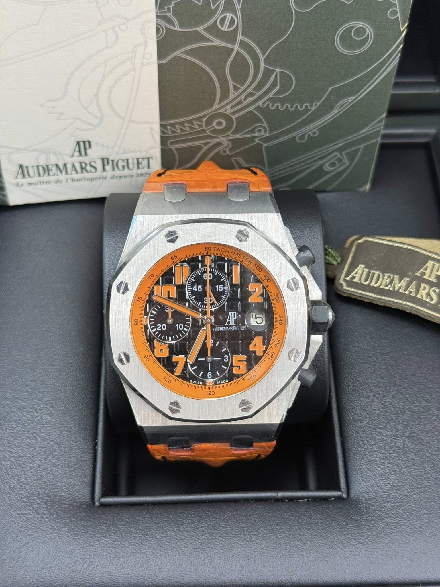 May be an image of wrist watch and text
