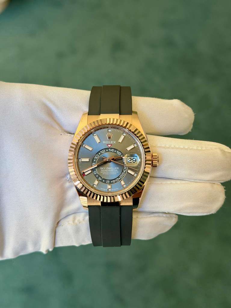 May be an image of wrist watch and text