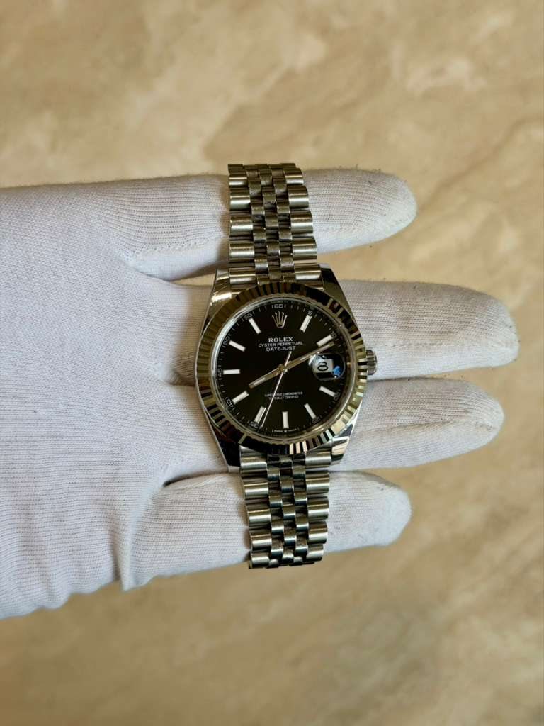 May be an image of wrist watch