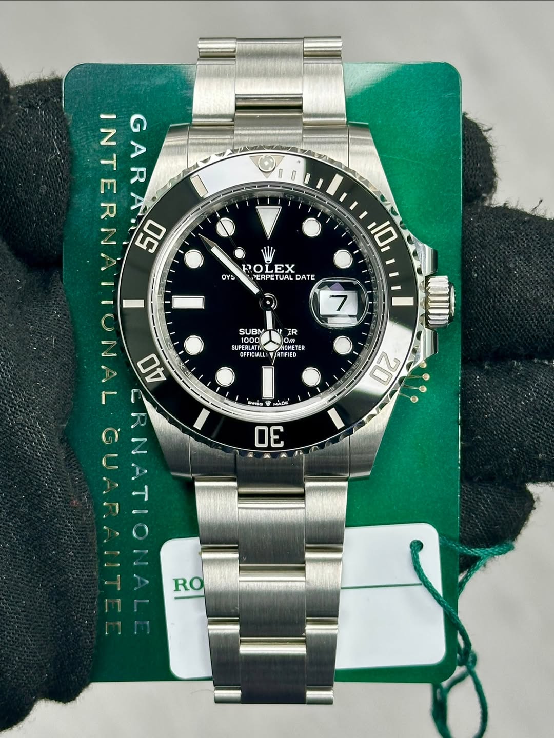 May be an image of wrist watch and text that says 'INTERNA GARA 05 W RO ROLEX LEX OYS PERPETUAL RPETUAL ETUAL DATE PERPE 10 7 SUBM ប" CERIFIALL OFFICIALL IR yo METE ER Dm IRTIFIED…