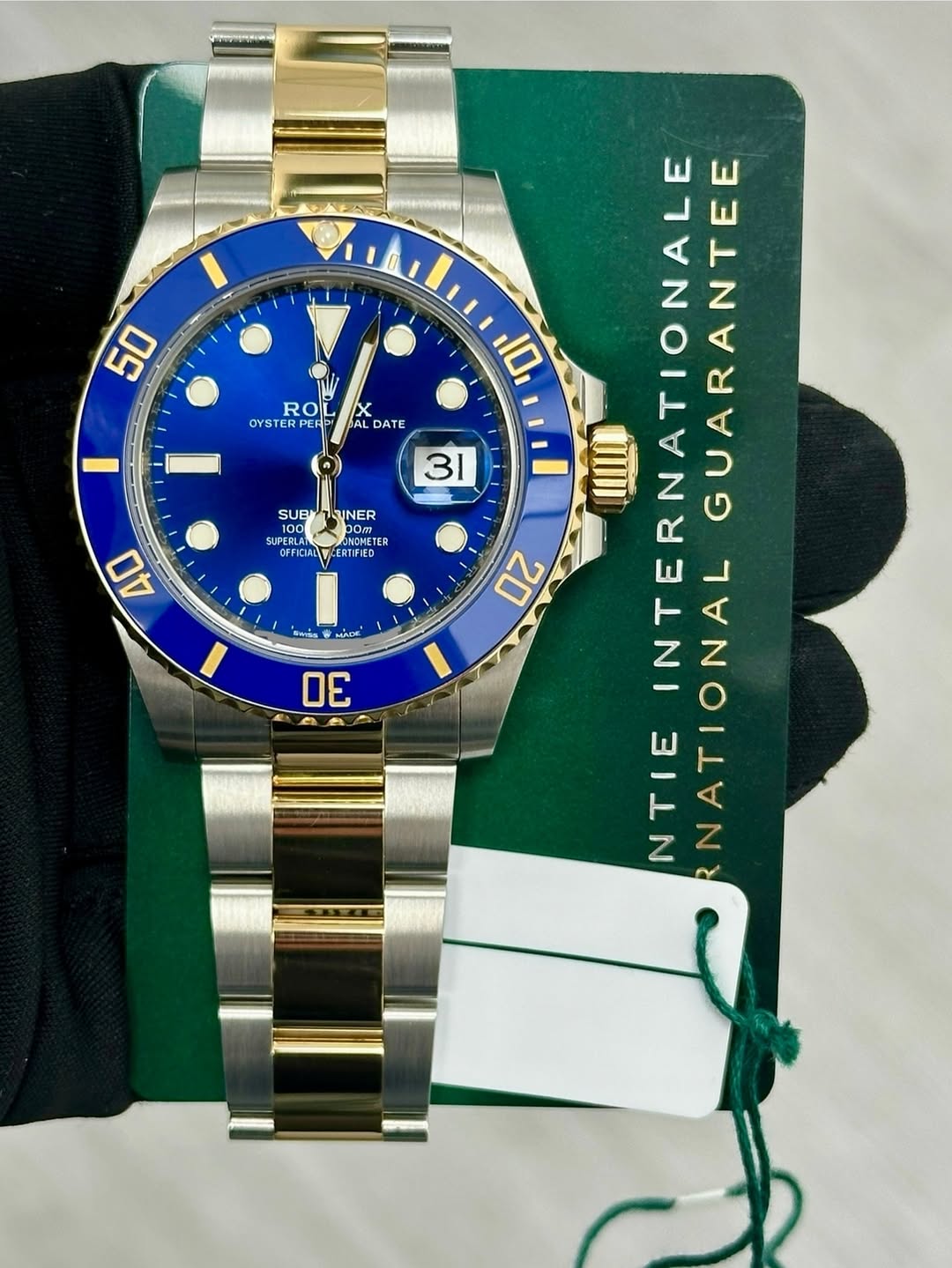 May be an image of wrist watch and text that says '50 ROL OYST OYSTERPER X AL DATE 31 SUB UNER SUPERLE 100 и.. NOMIETER TES TER 0.. CEFICIAL VCE ERTIFIED 40 தொ் MAO HacK 30 10…