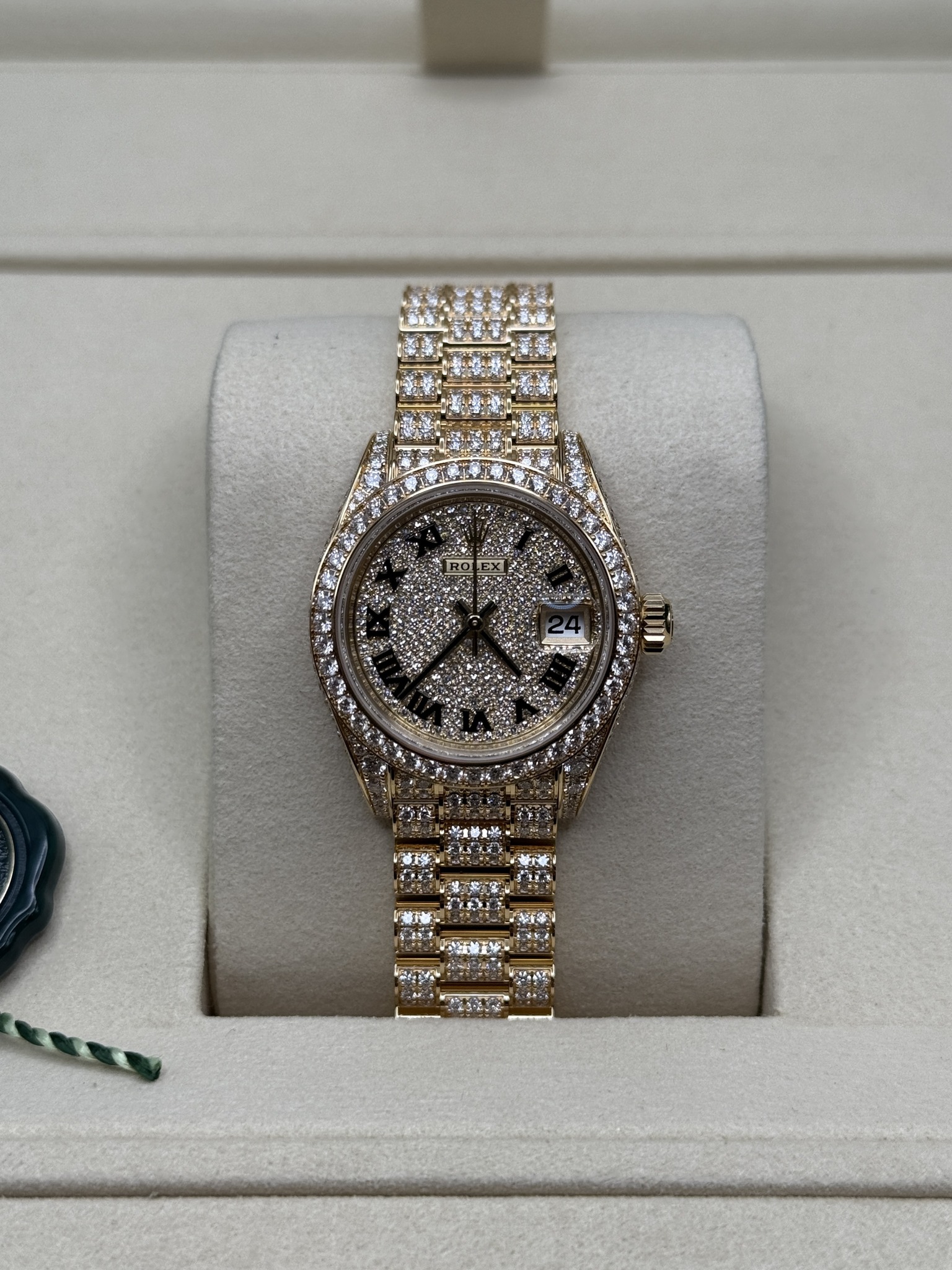 May be an image of wrist watch and text
