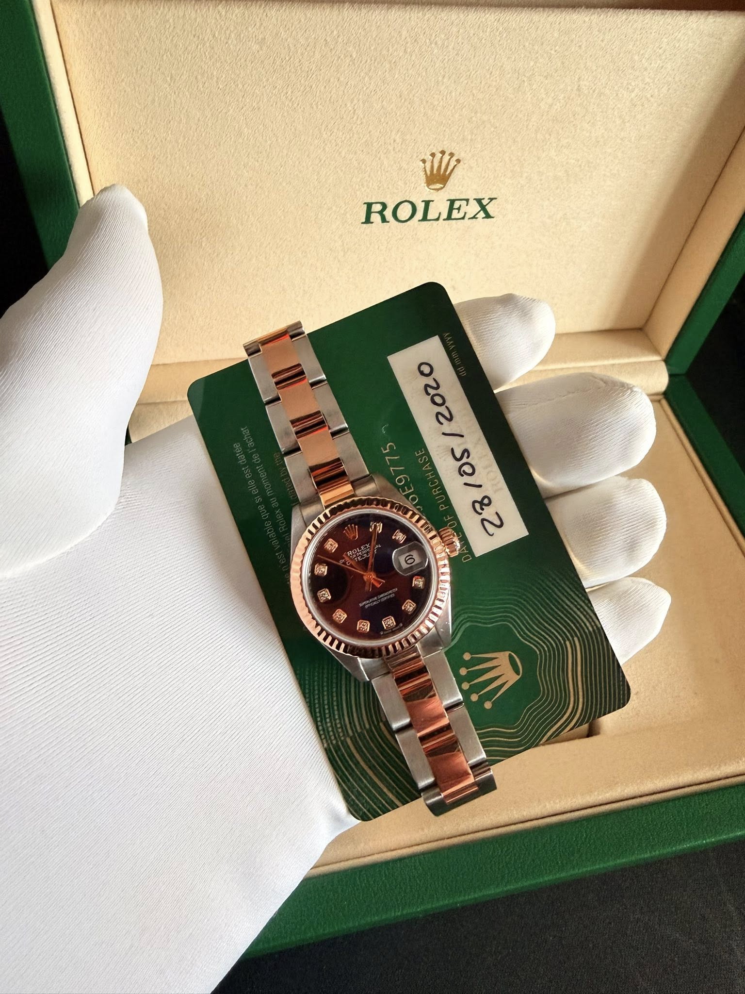 May be an image of wrist watch and text