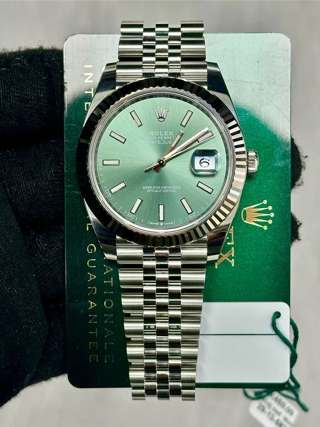 May be an image of wrist watch and text