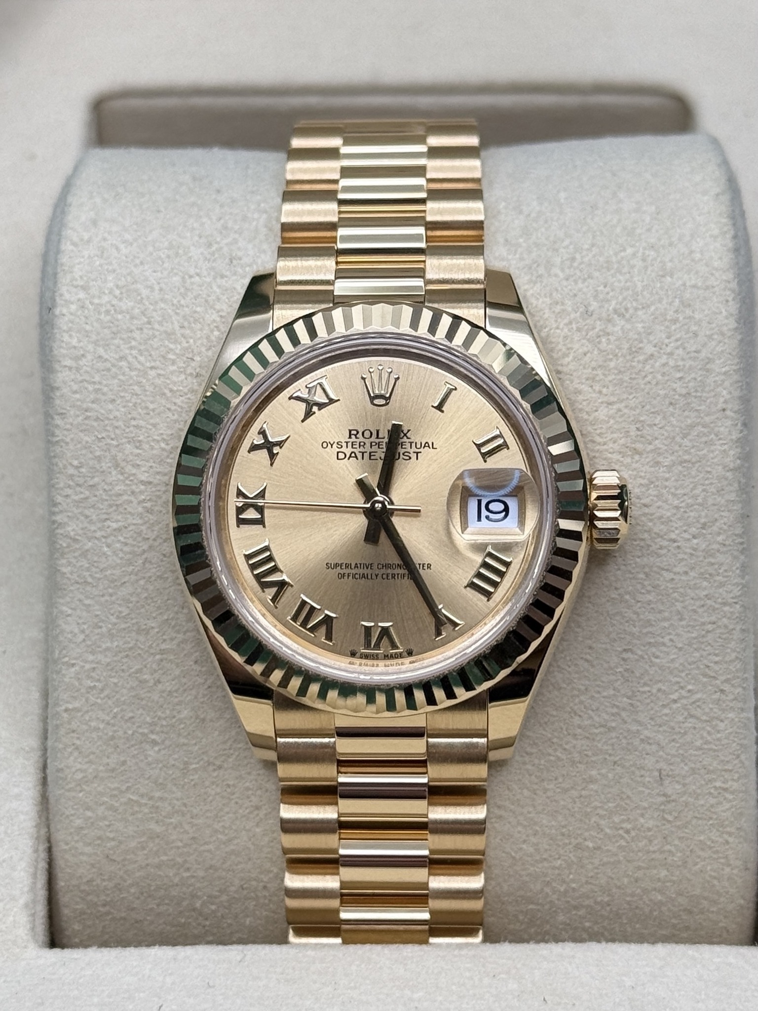 May be an image of wrist watch and text