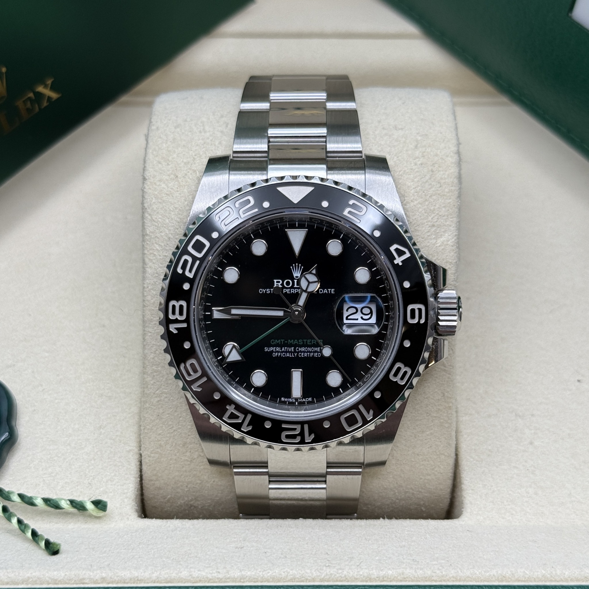 May be an image of wrist watch and text