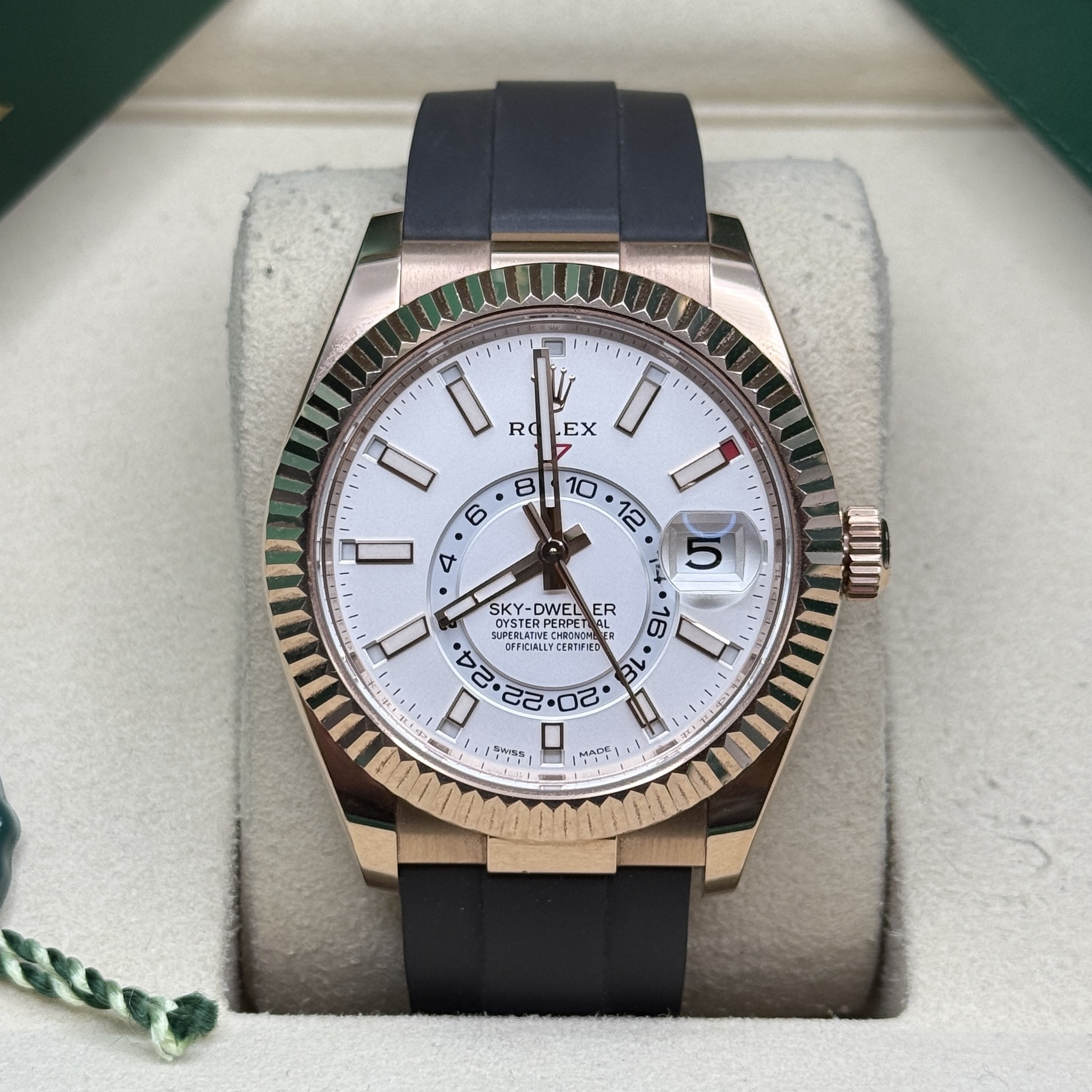 May be an image of wrist watch and text