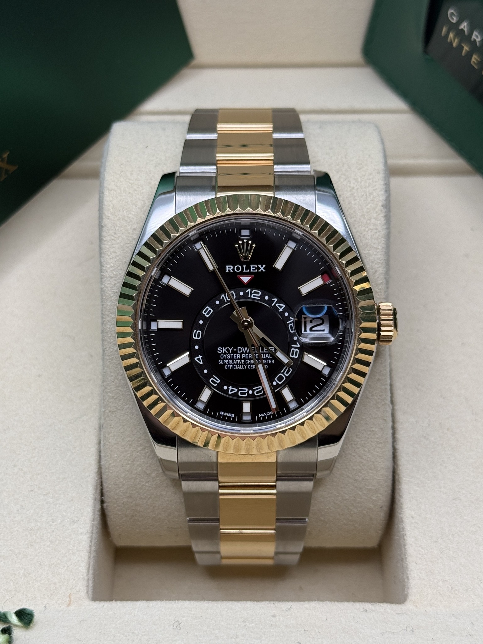 May be an image of wrist watch and text