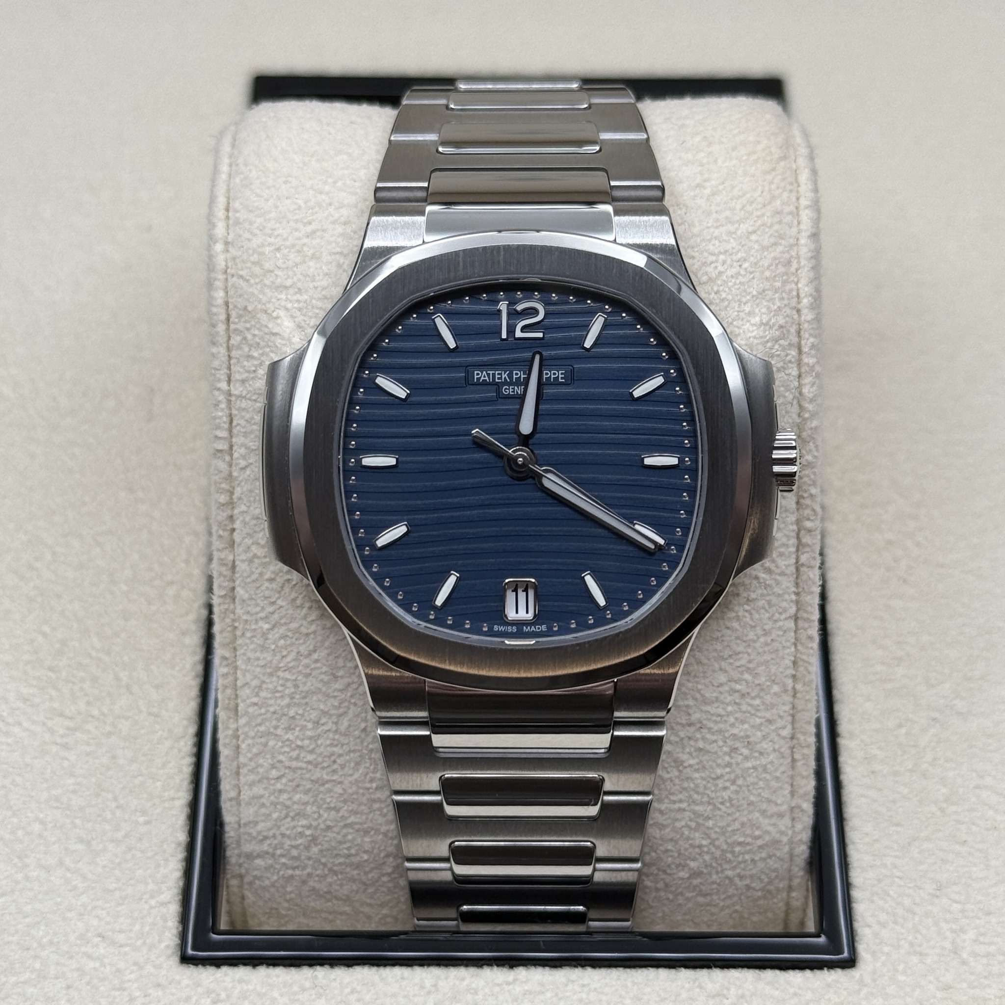 May be an image of wrist watch and text