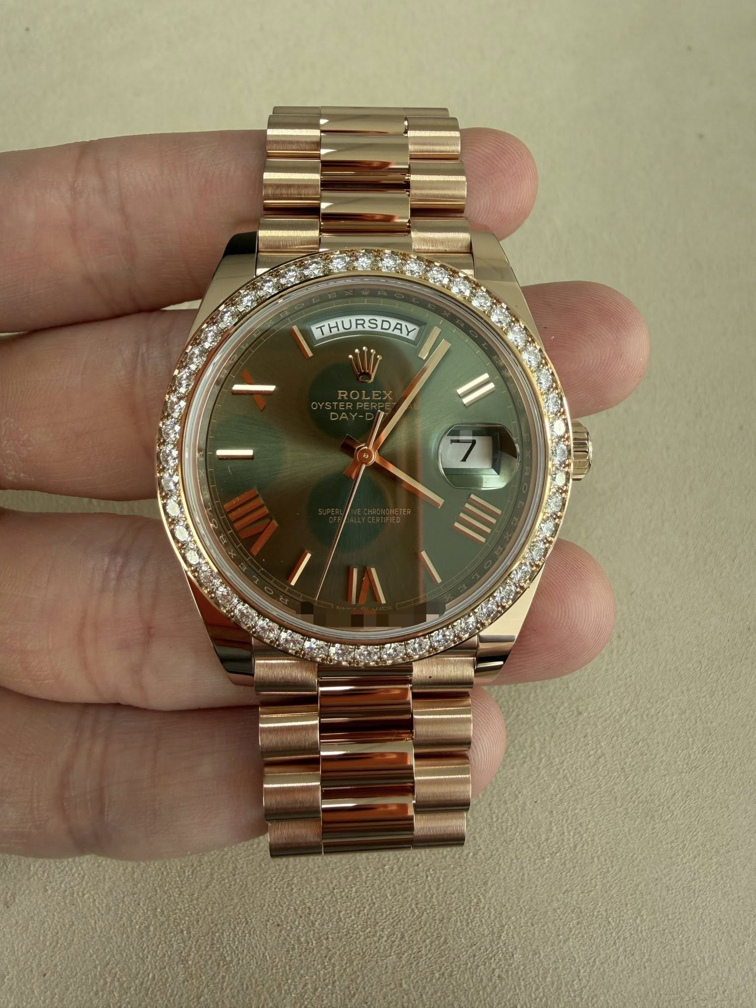May be an image of wrist watch and text that says 'THURSDAY a 7 II ١'