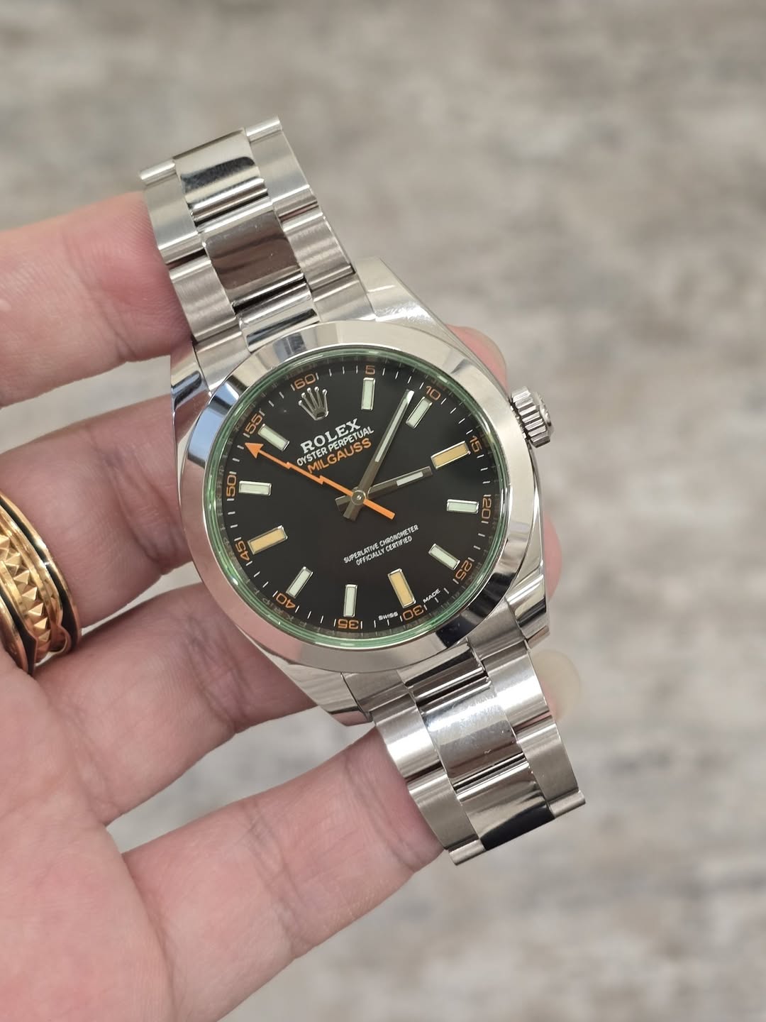 May be an image of wrist watch and text