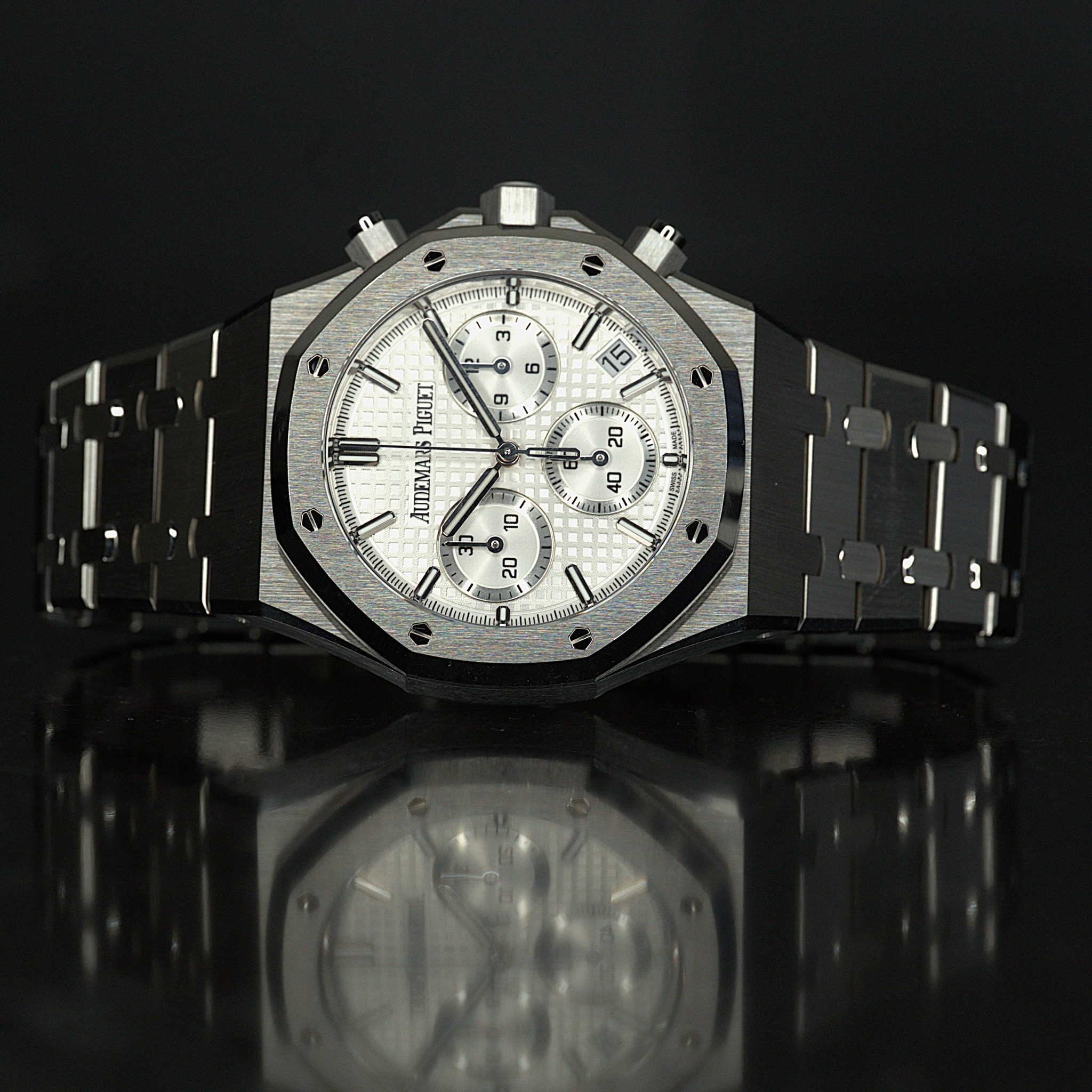 May be an image of wrist watch and text