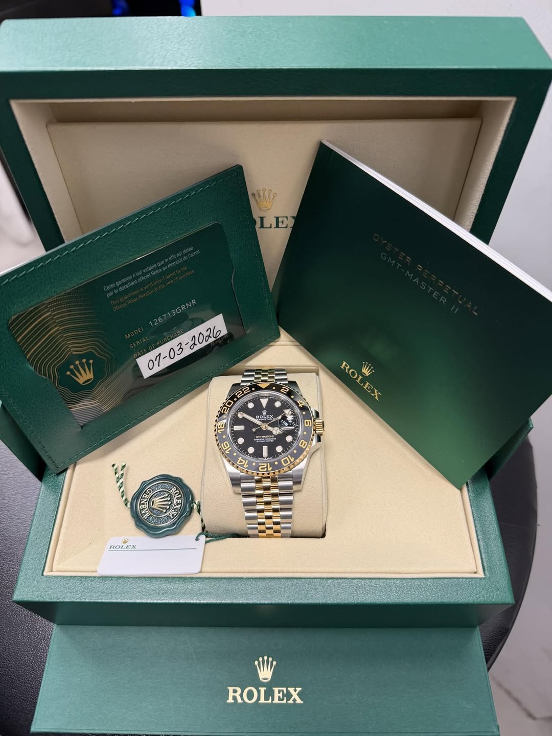 May be an image of wrist watch and text