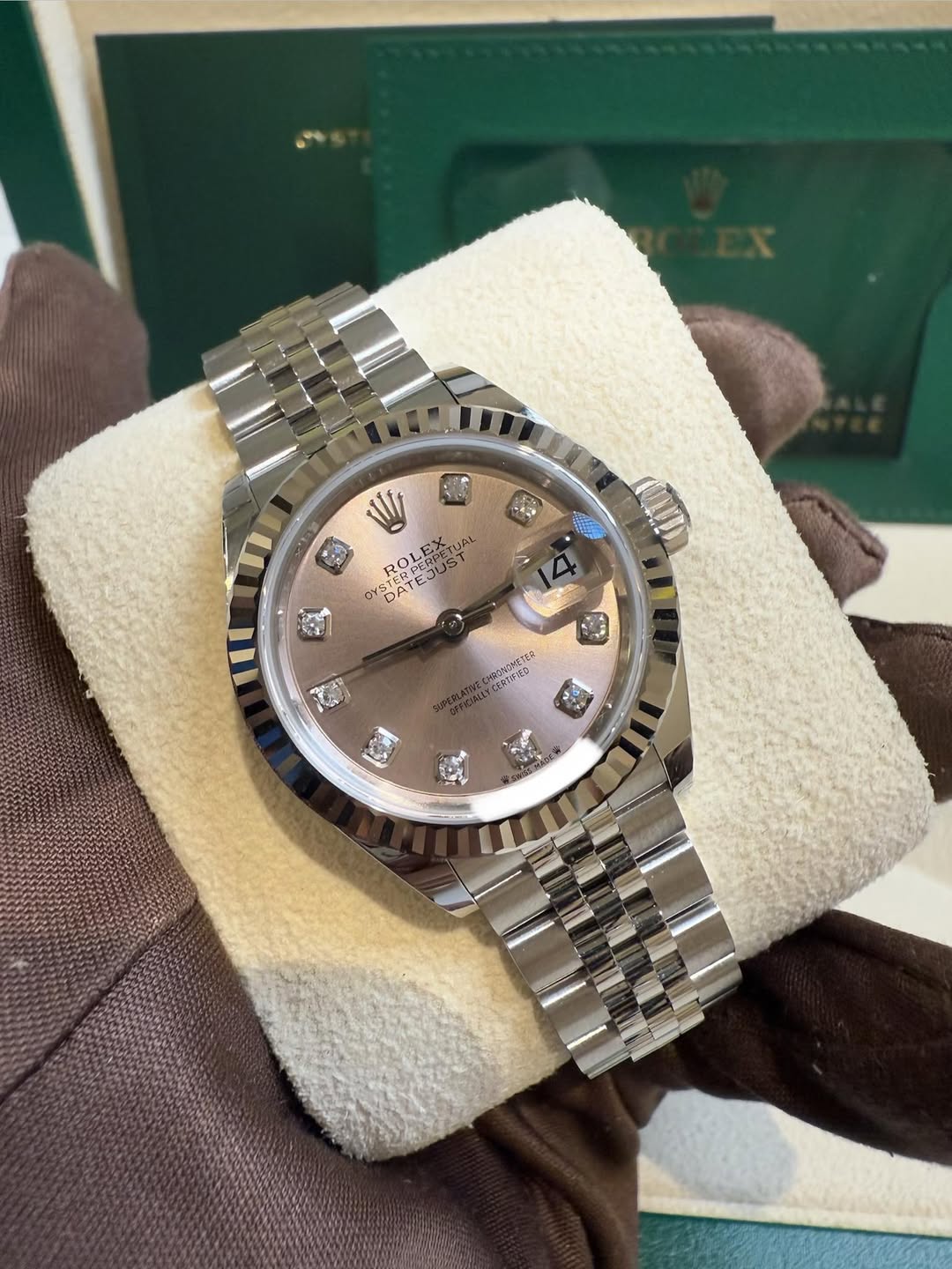 May be an image of wrist watch and text