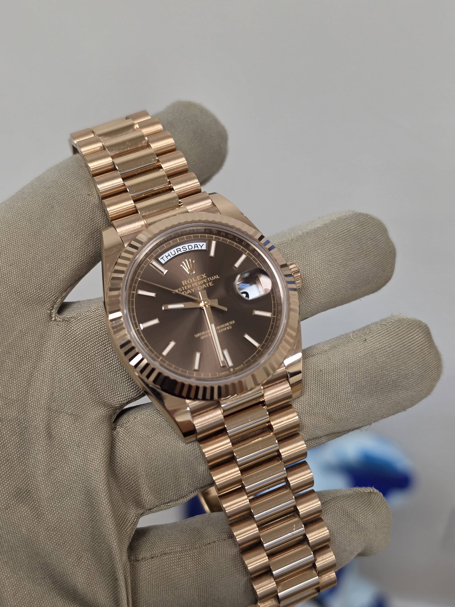 May be an image of wrist watch and text