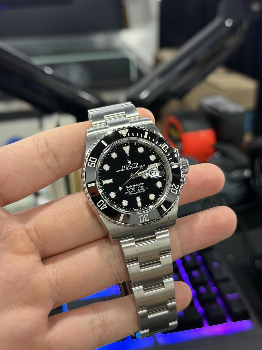 May be an image of wrist watch and text
